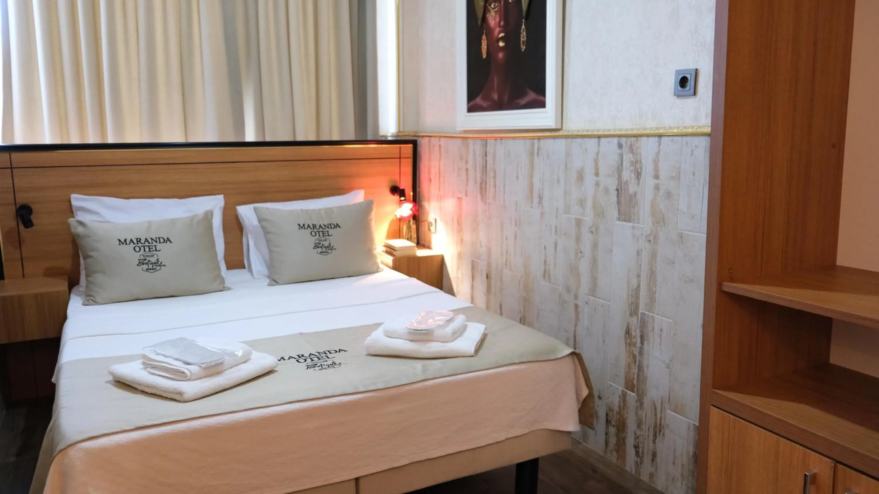 Bed in Maranda Suit Hotel