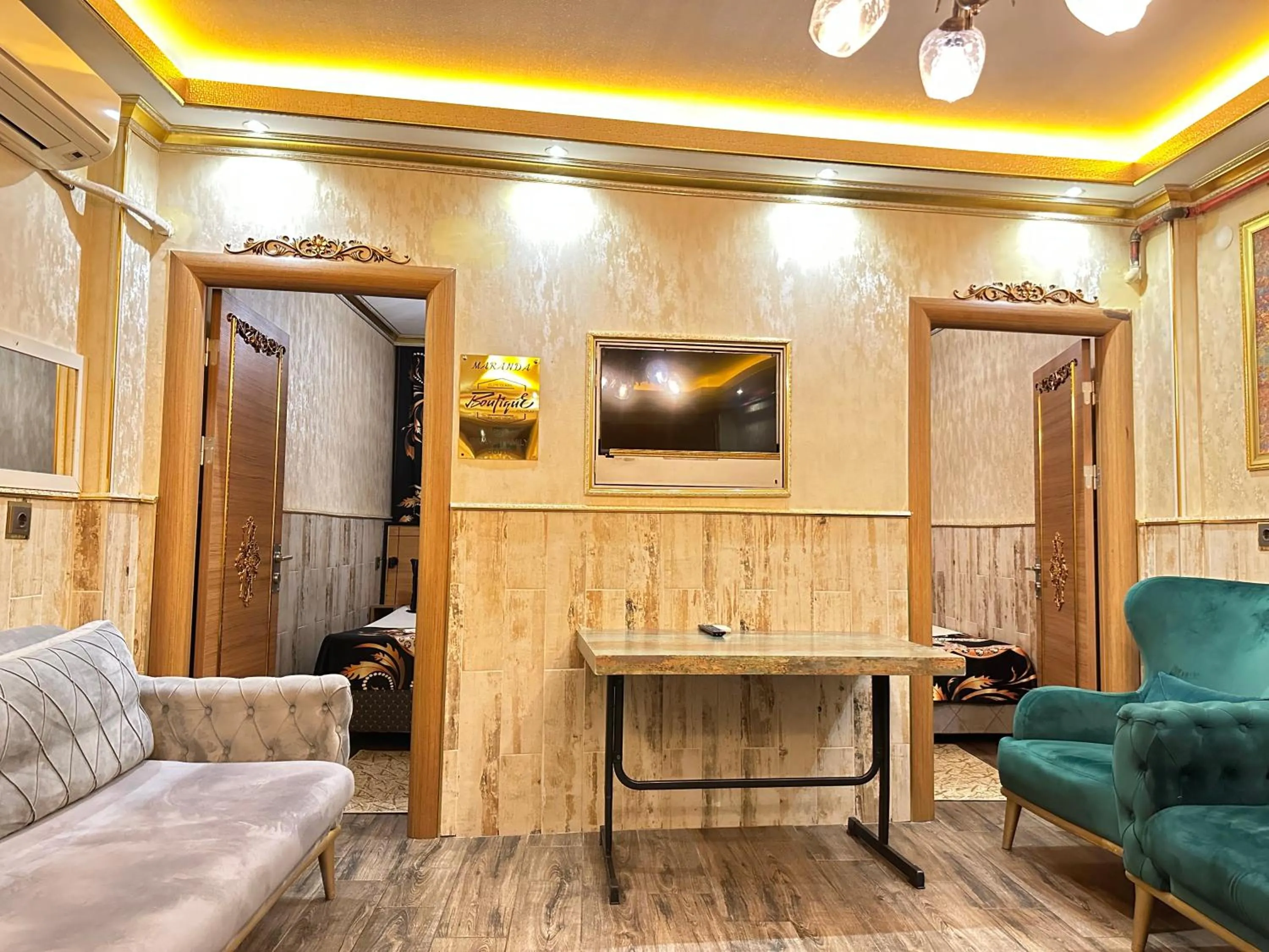 TV and multimedia in Maranda Suit Hotel