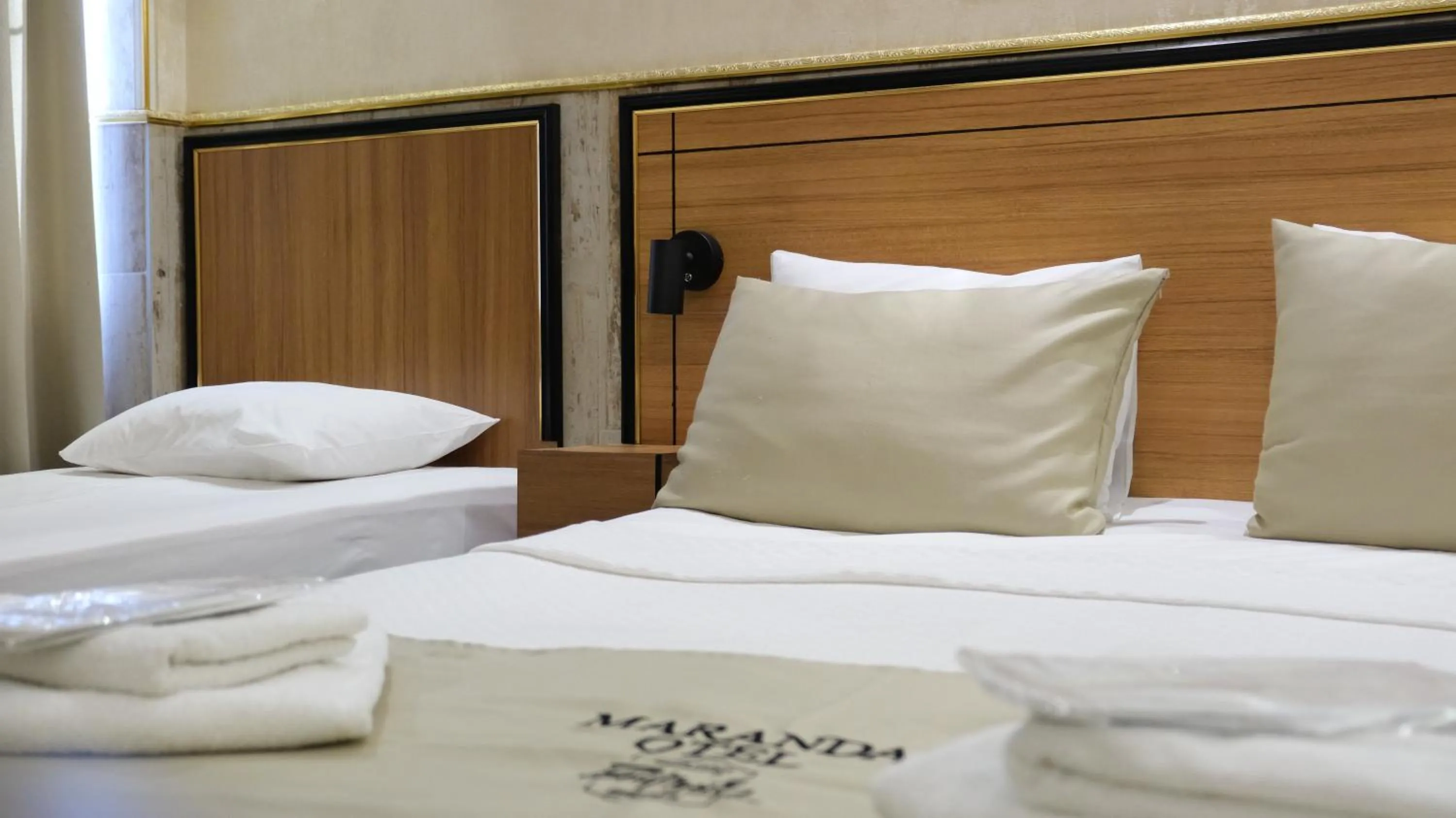 Bed in Maranda Suit Hotel