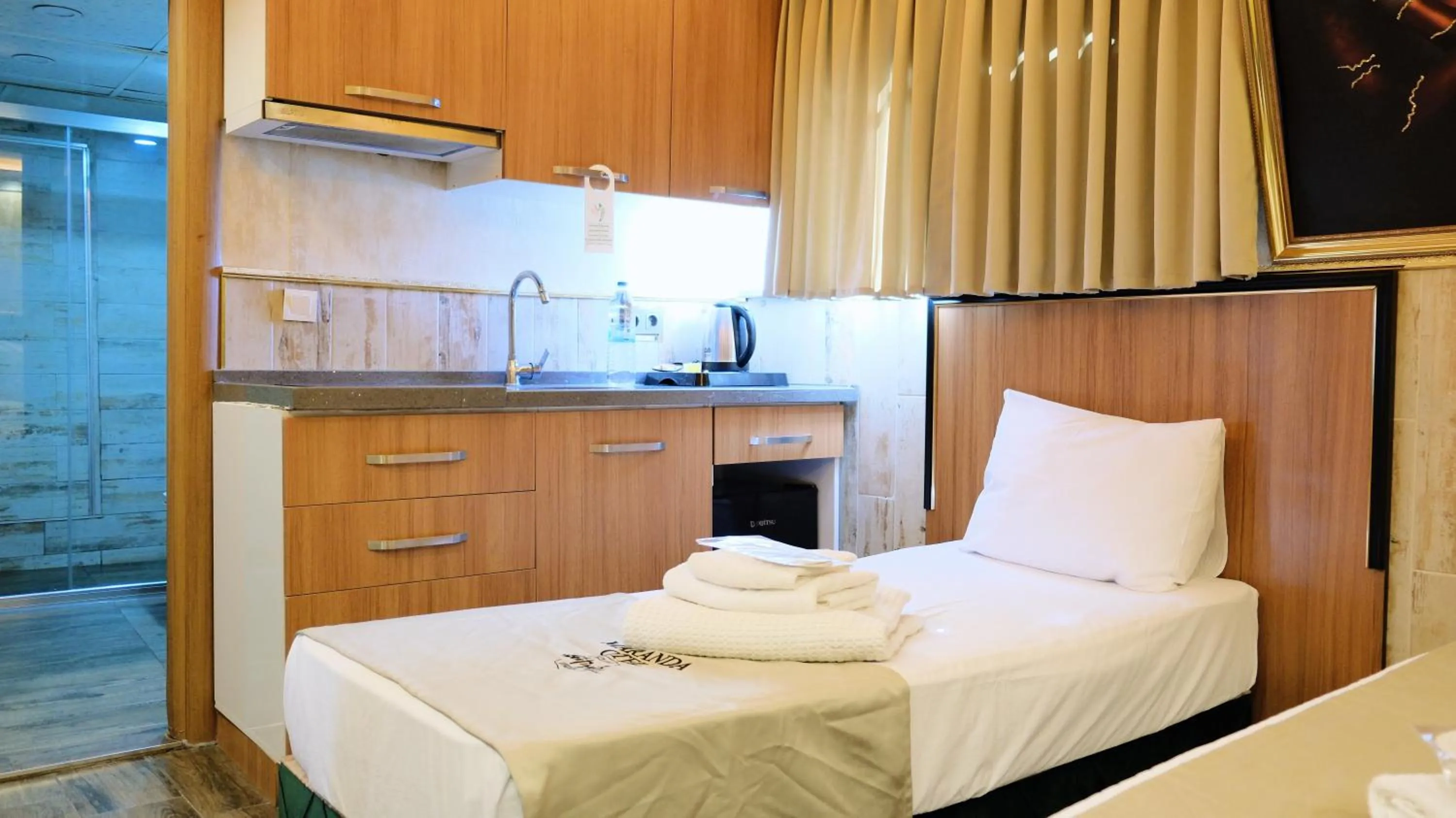 Bed in Maranda Suit Hotel