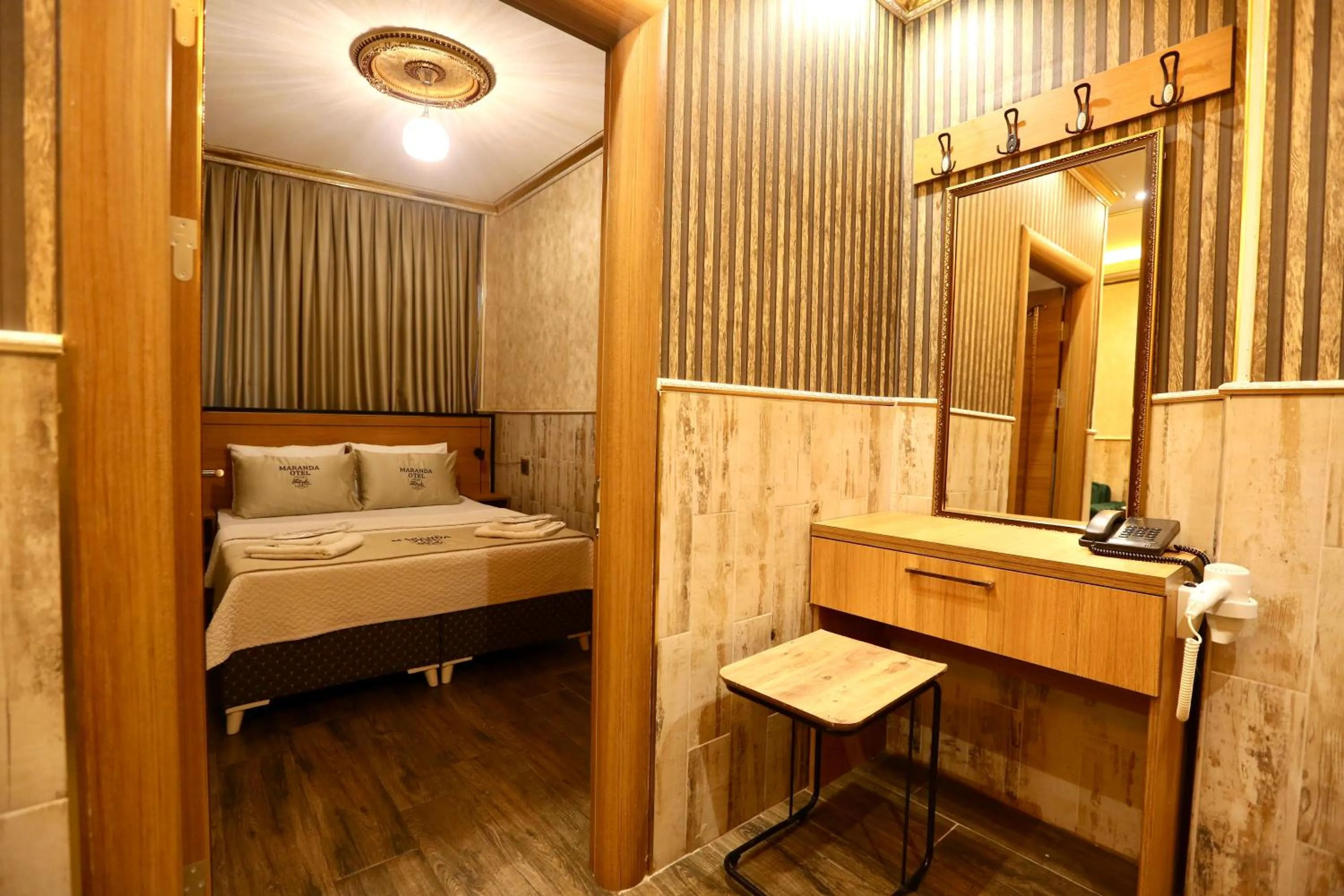 Bed in Maranda Suit Hotel