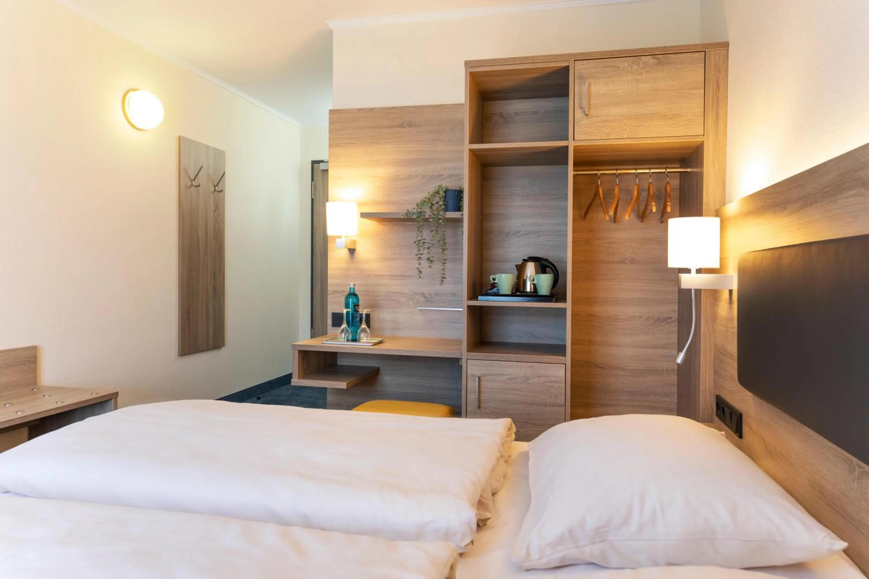 Photo of the whole room, Bed in Roomingtons Hotel Lohr am Main