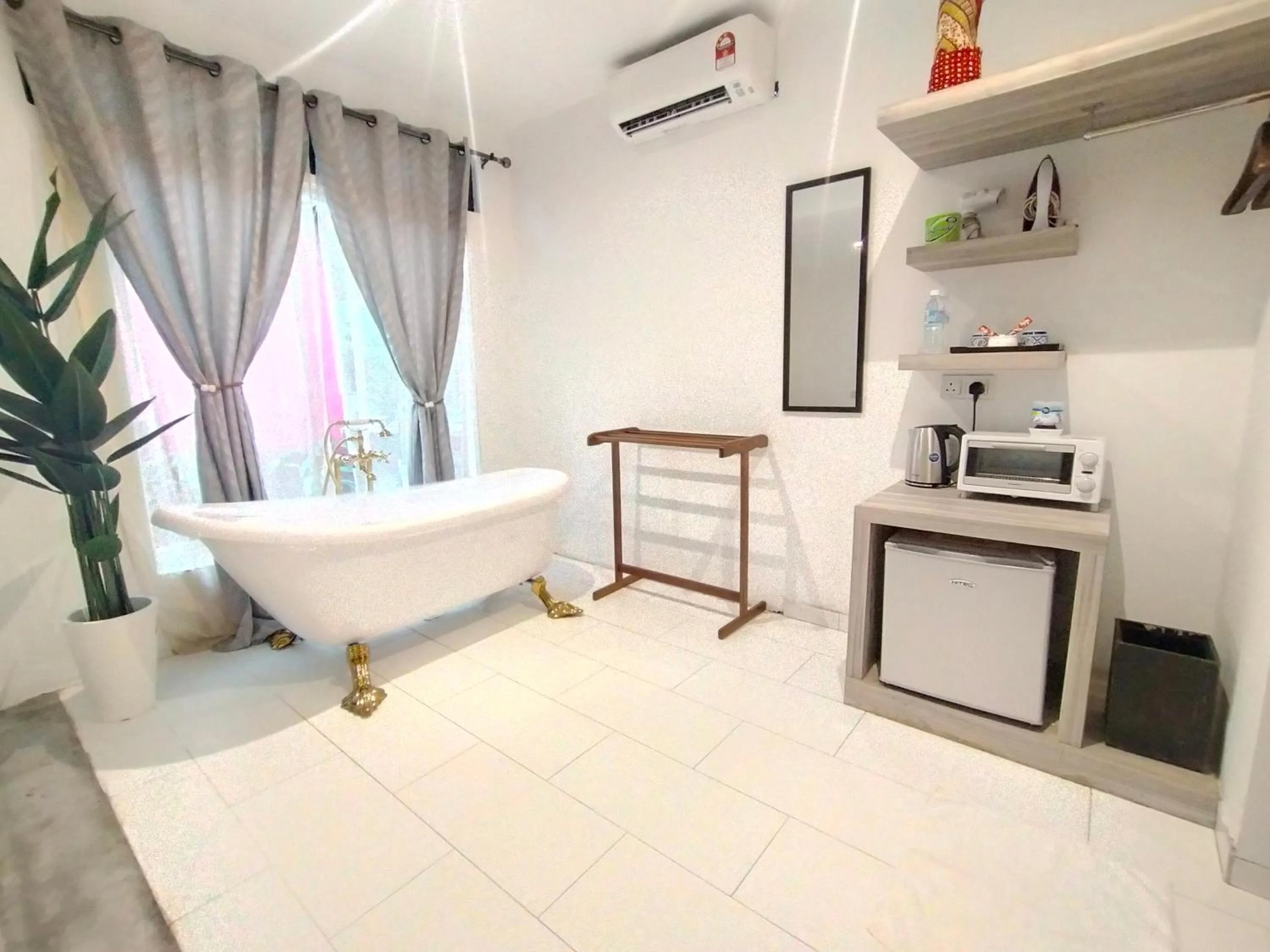 Kitchen or kitchenette, Bed in Tisha Langkawi Wellness Resort