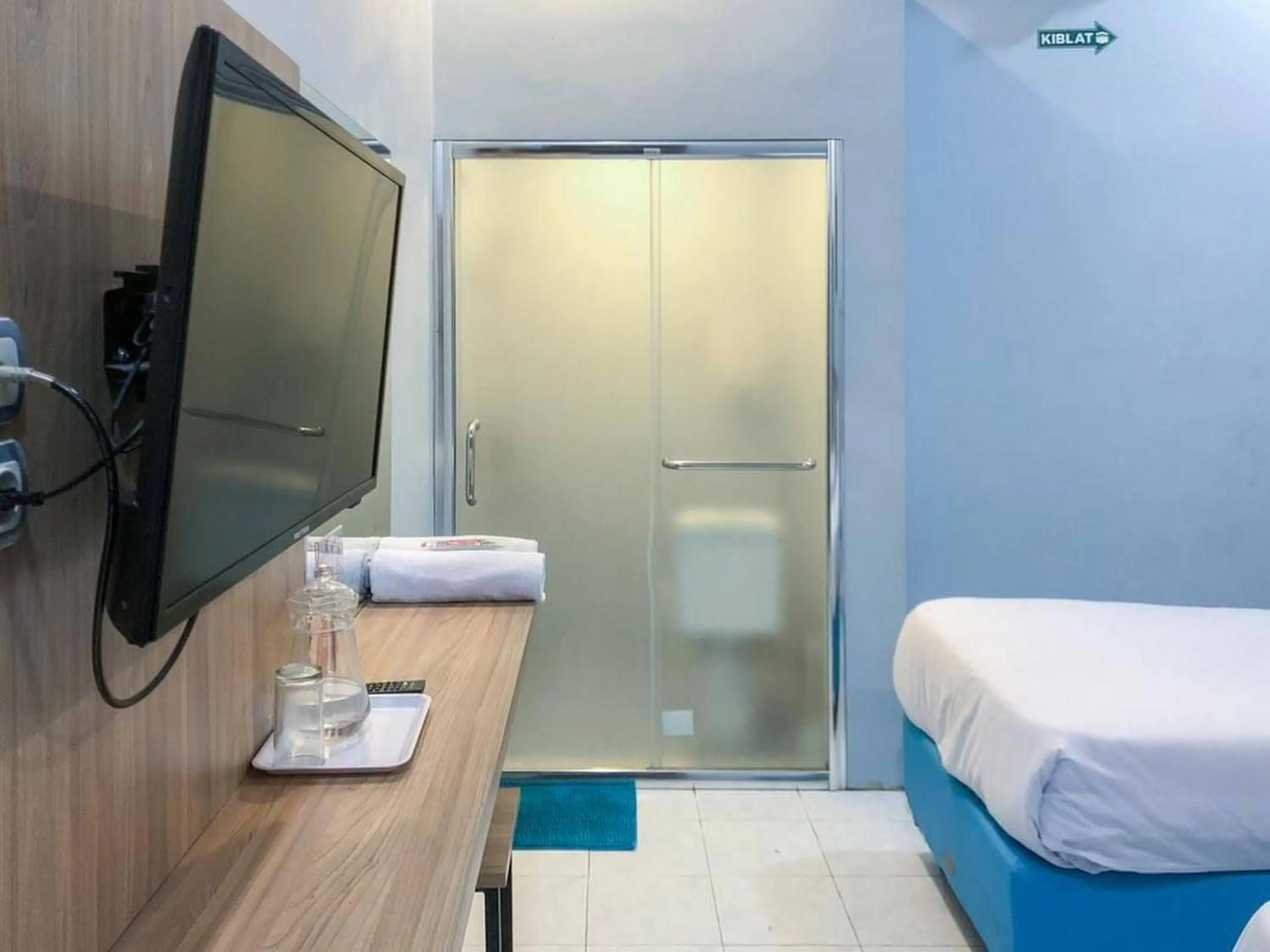 Bedroom, Bed in RedDoorz Syariah near Taman Rekreasi Sengkaling 2