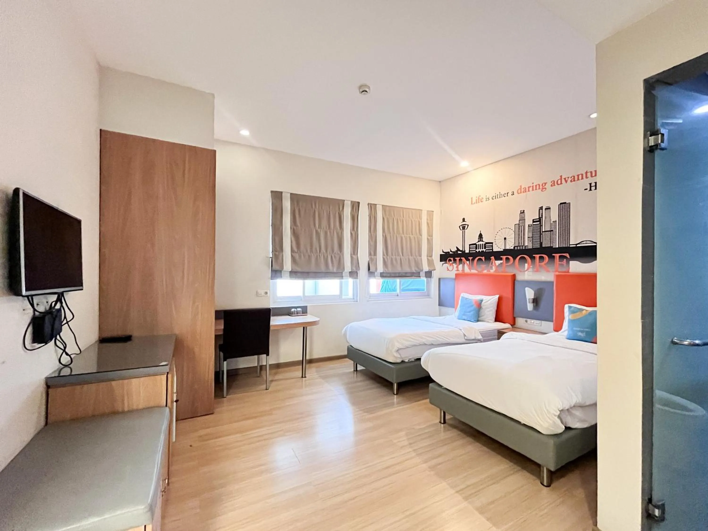 Bedroom, Bed in Sans Hotel Syariah Graha 100 Gubeng Surabaya