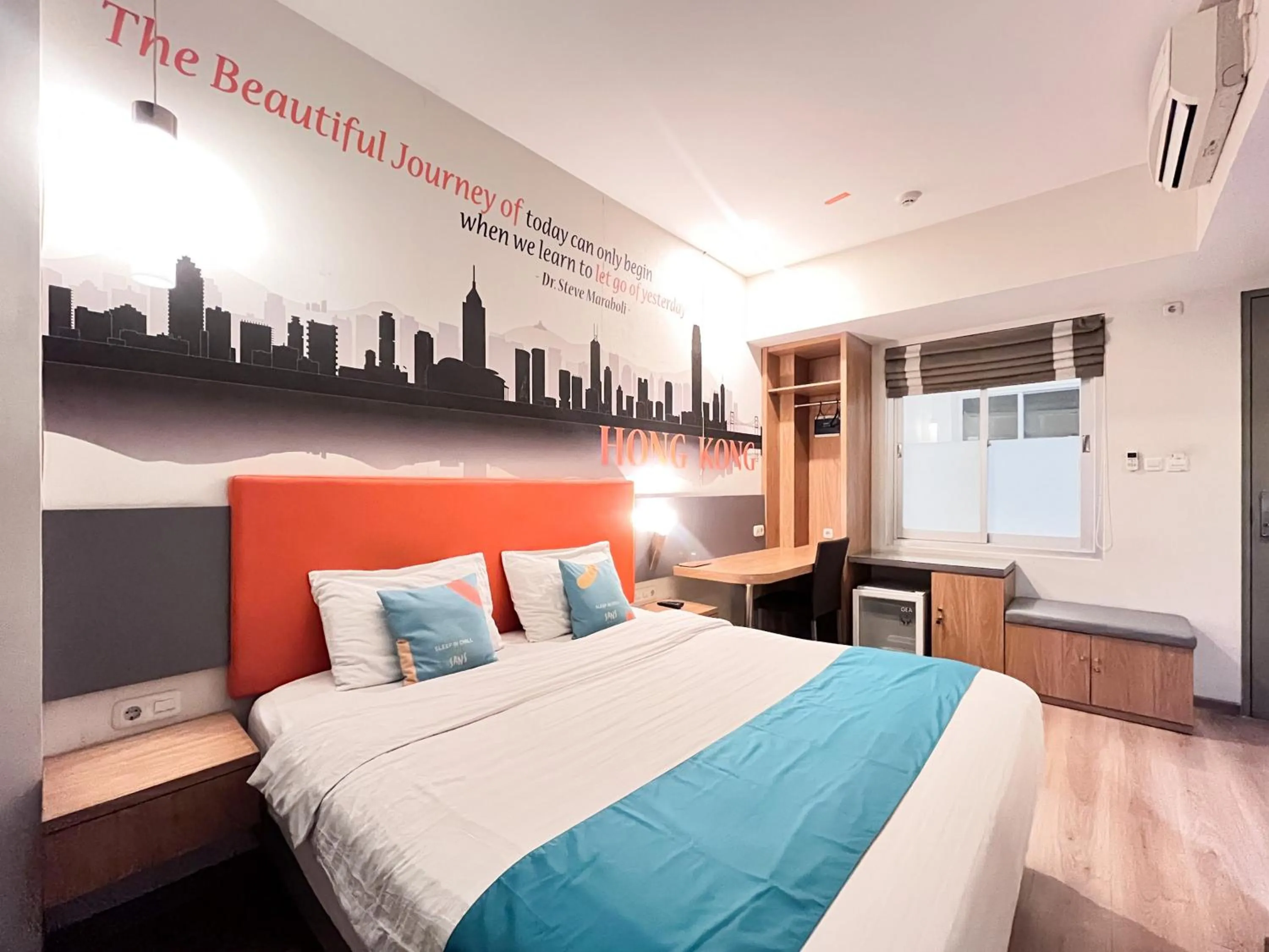 Bedroom, Bed in Sans Hotel Syariah Graha 100 Gubeng Surabaya