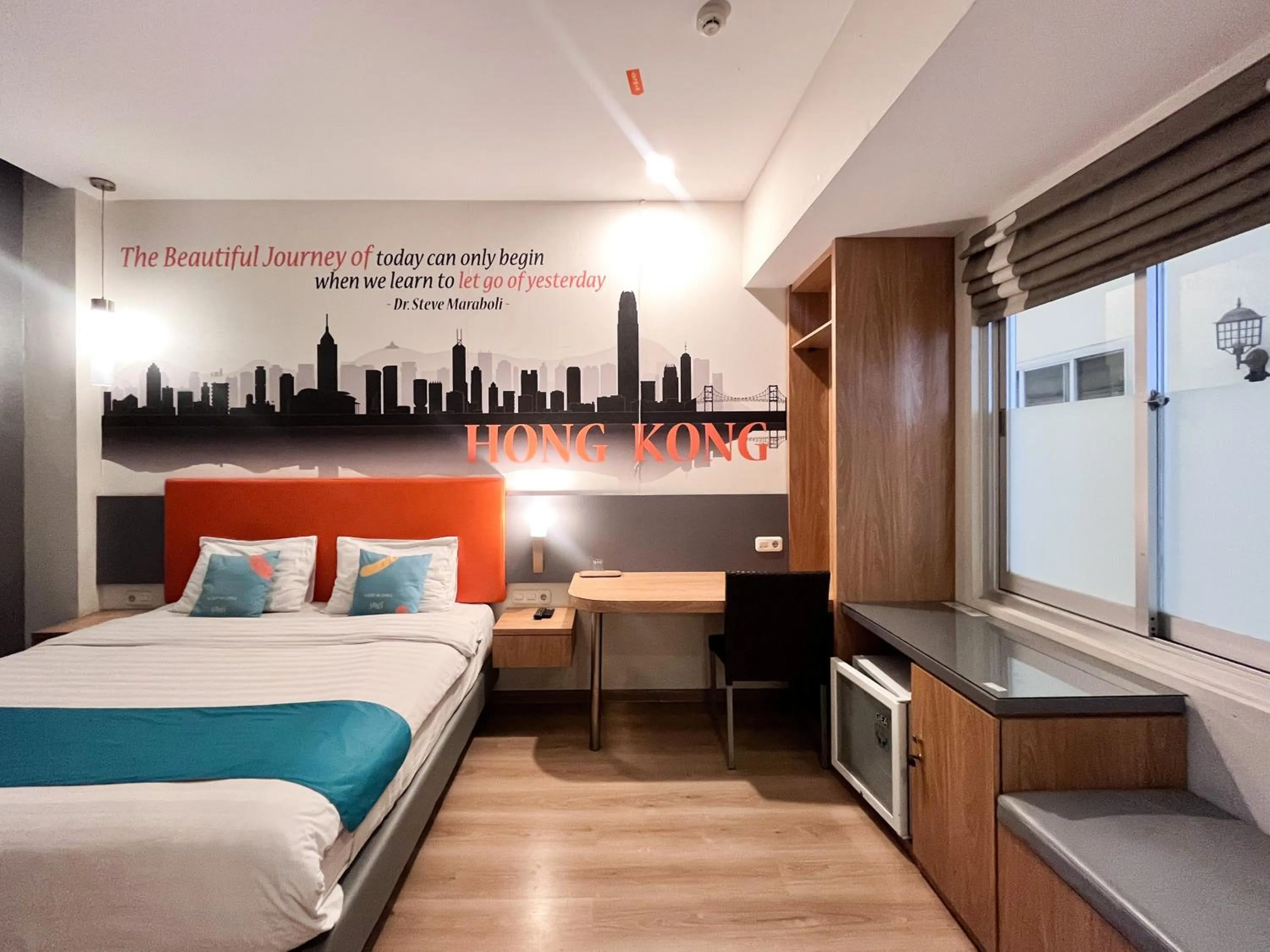 Bedroom, Bed in Sans Hotel Syariah Graha 100 Gubeng Surabaya