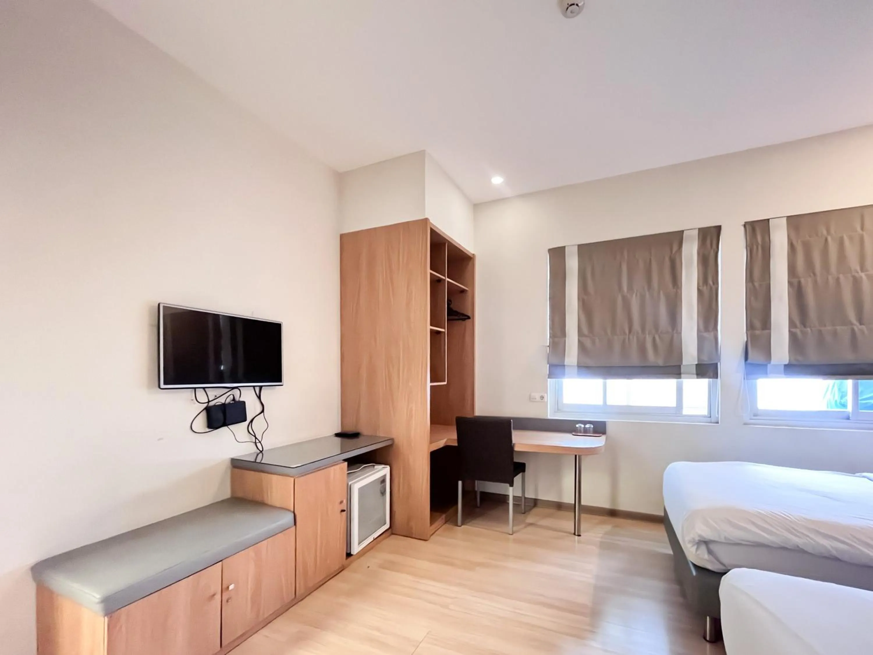 Bedroom, Bed in Sans Hotel Syariah Graha 100 Gubeng Surabaya