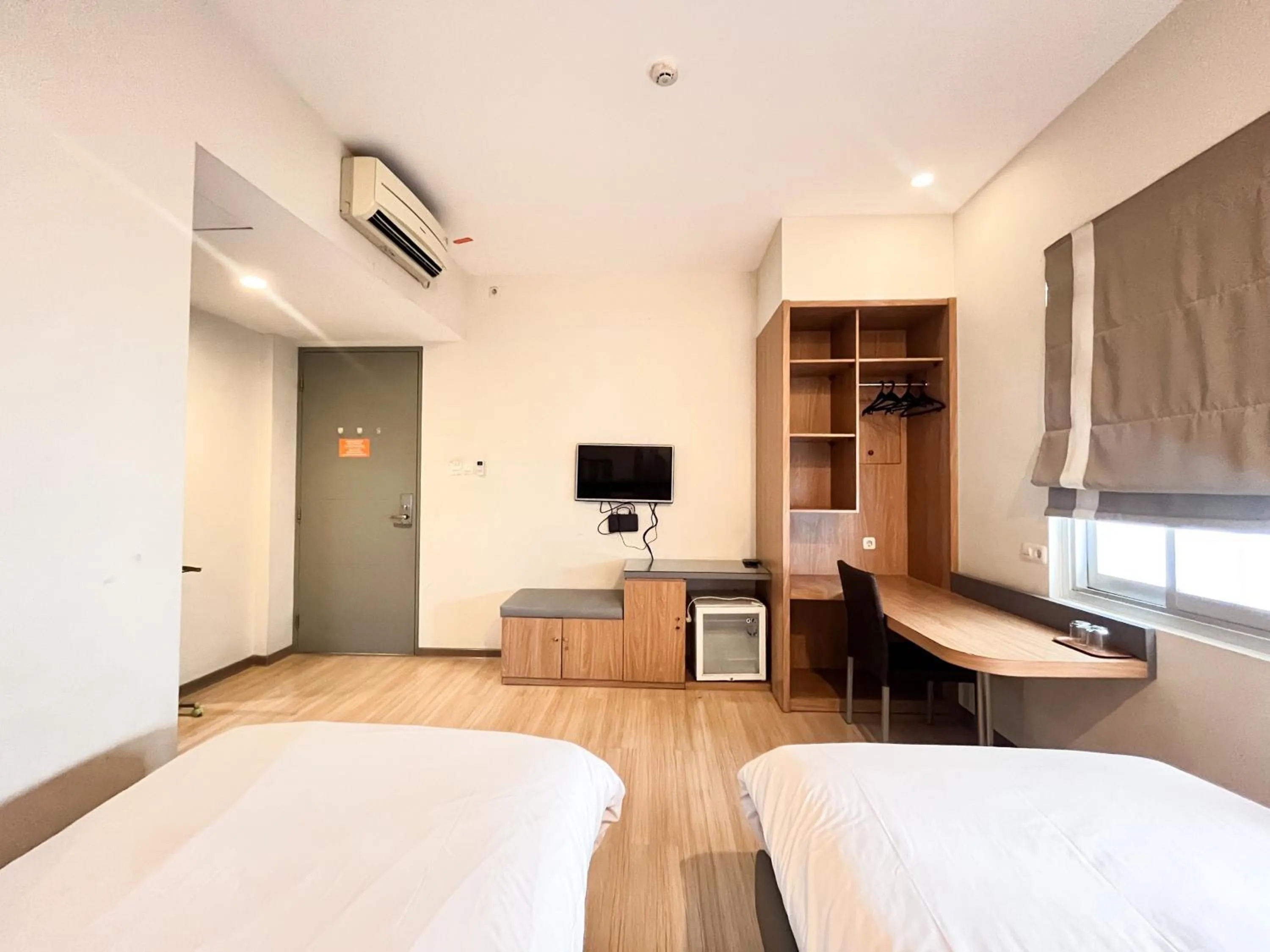 Bedroom, Bed in Sans Hotel Syariah Graha 100 Gubeng Surabaya