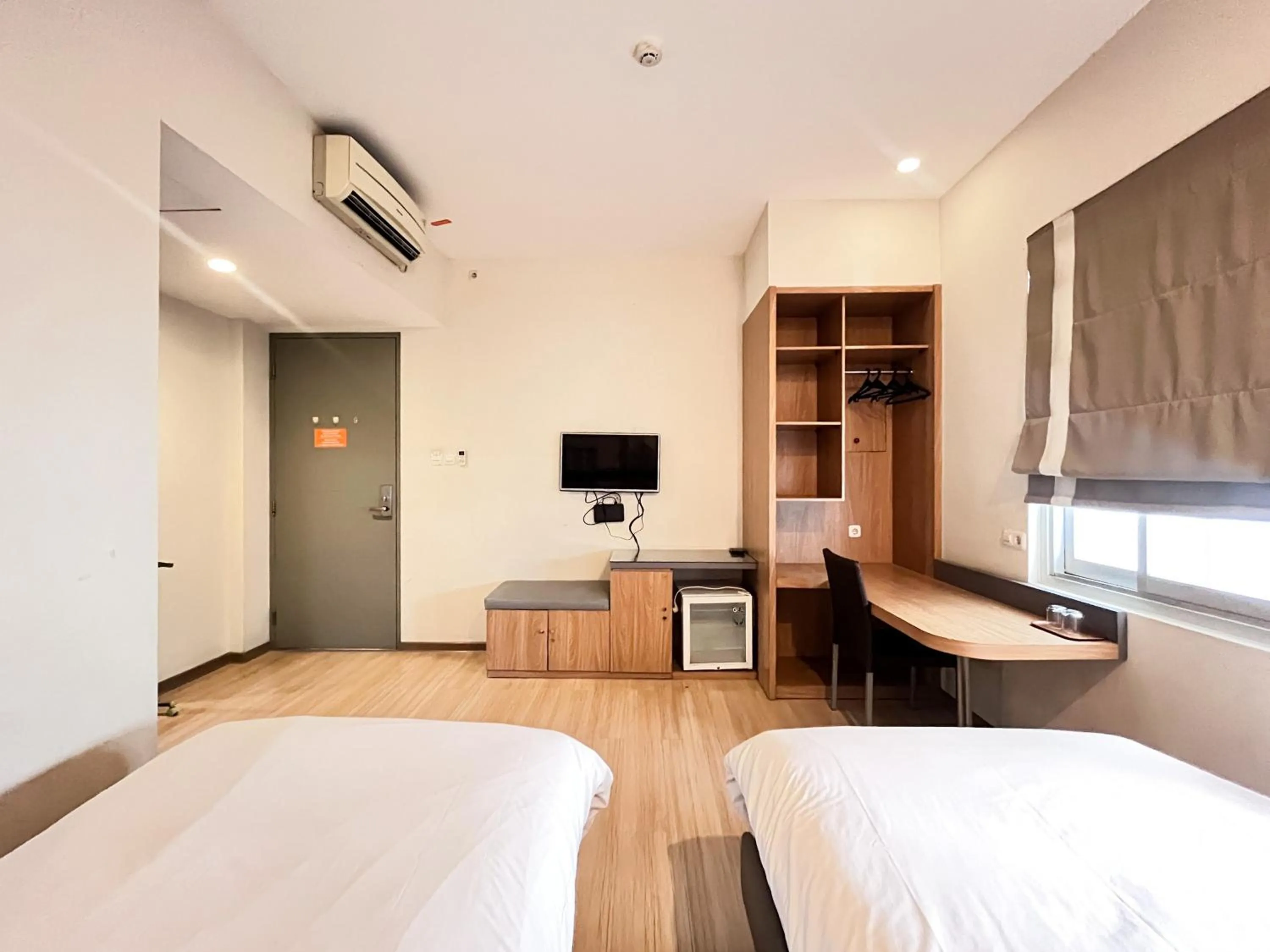 Bedroom, Bed in Sans Hotel Syariah Graha 100 Gubeng Surabaya