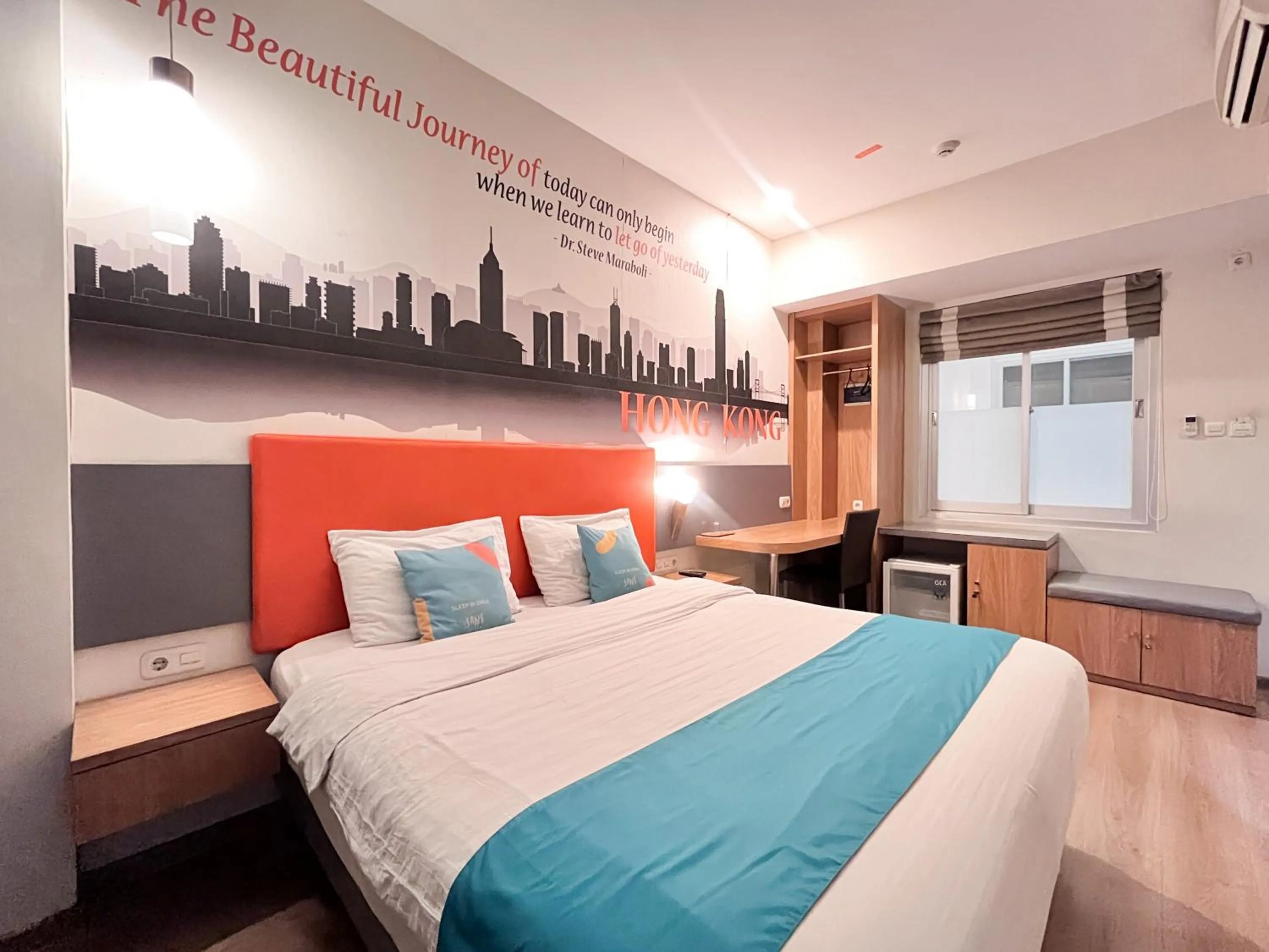 Bedroom, Bed in Sans Hotel Syariah Graha 100 Gubeng Surabaya