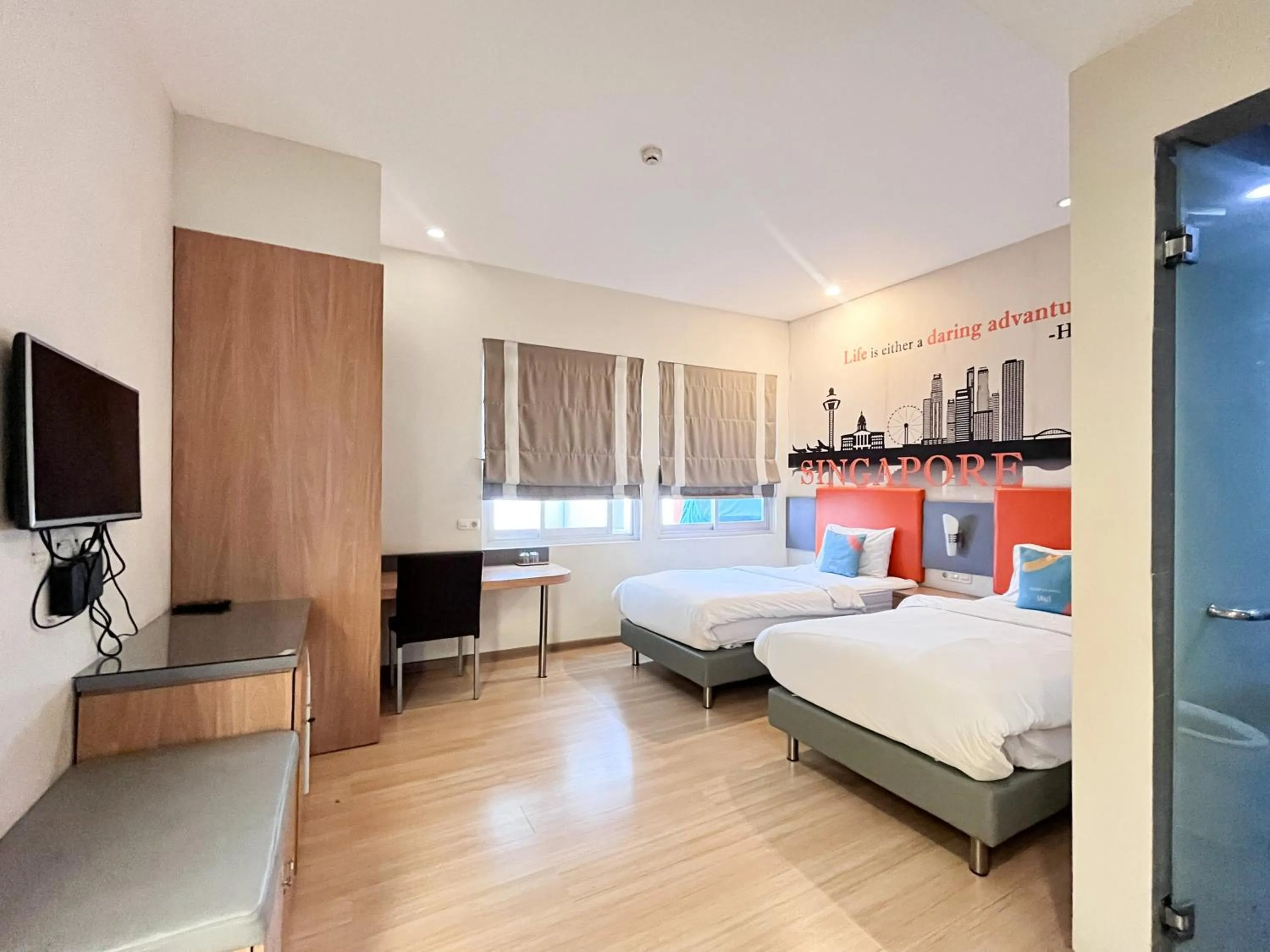 Bedroom, Bed in Sans Hotel Syariah Graha 100 Gubeng Surabaya