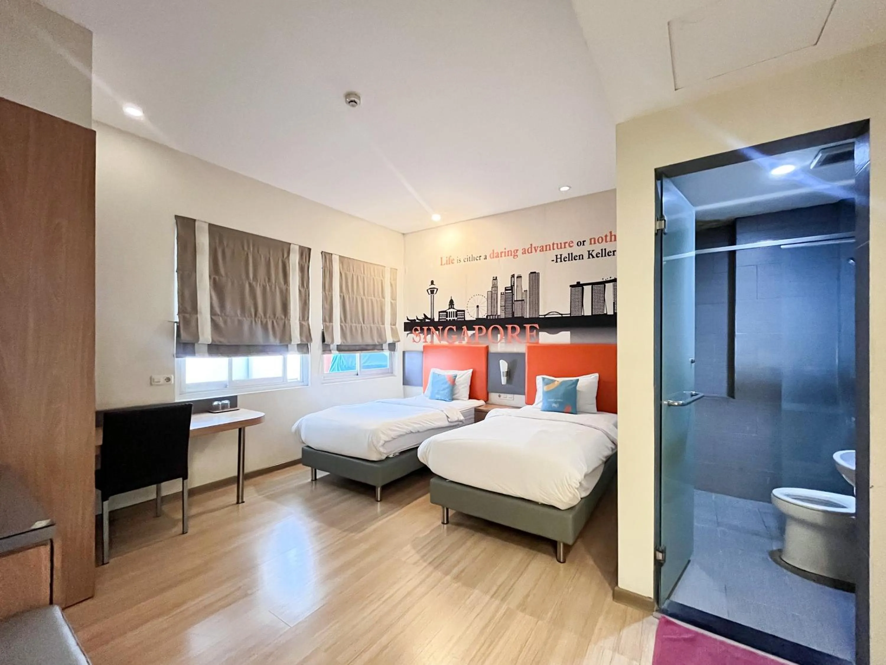 Bedroom, Bed in Sans Hotel Syariah Graha 100 Gubeng Surabaya