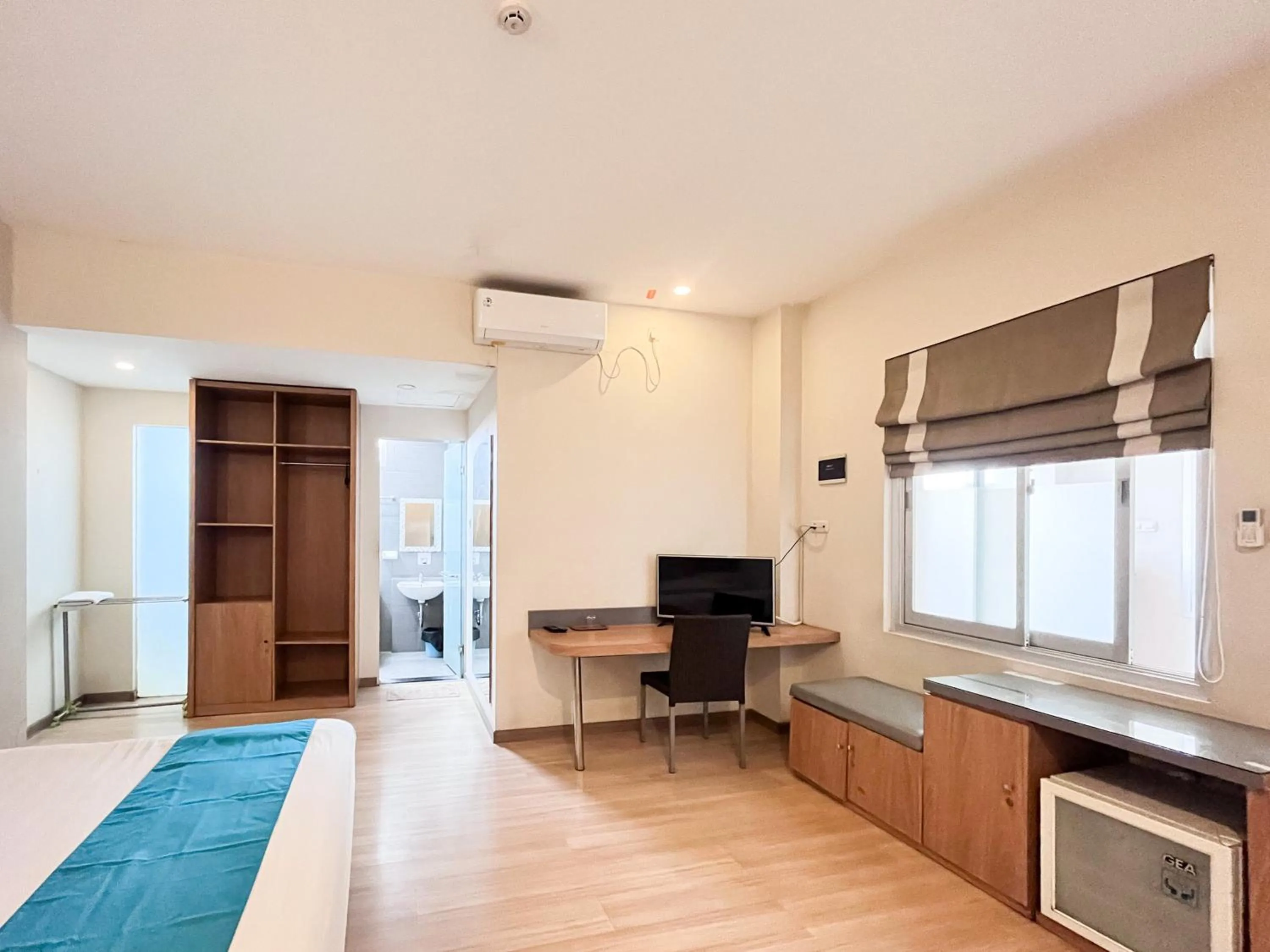 Bedroom in Sans Hotel Syariah Graha 100 Gubeng Surabaya