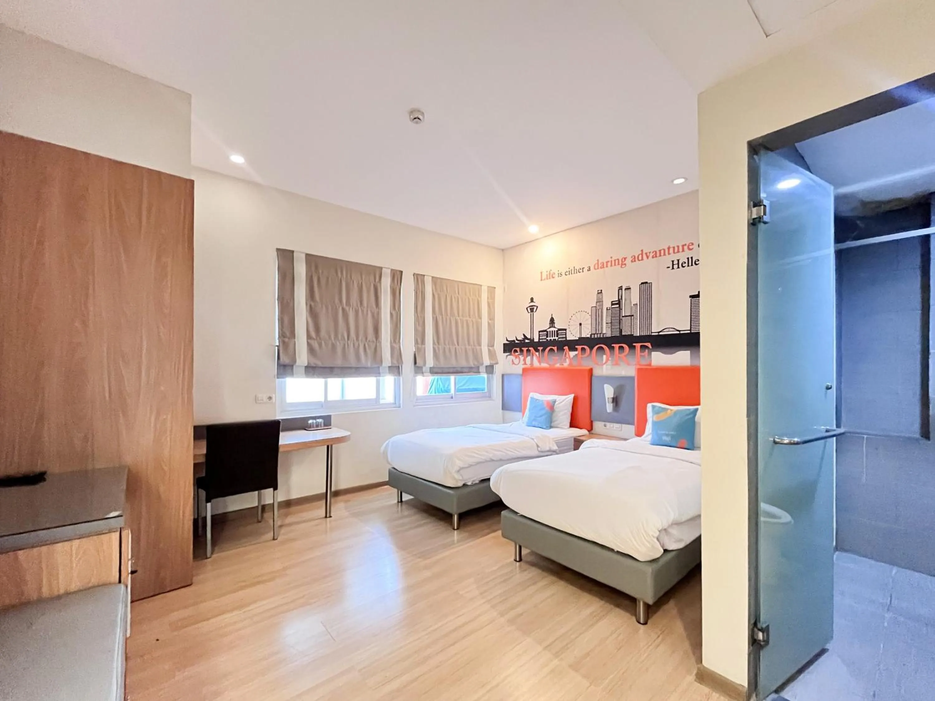 Bedroom, Bed in Sans Hotel Syariah Graha 100 Gubeng Surabaya