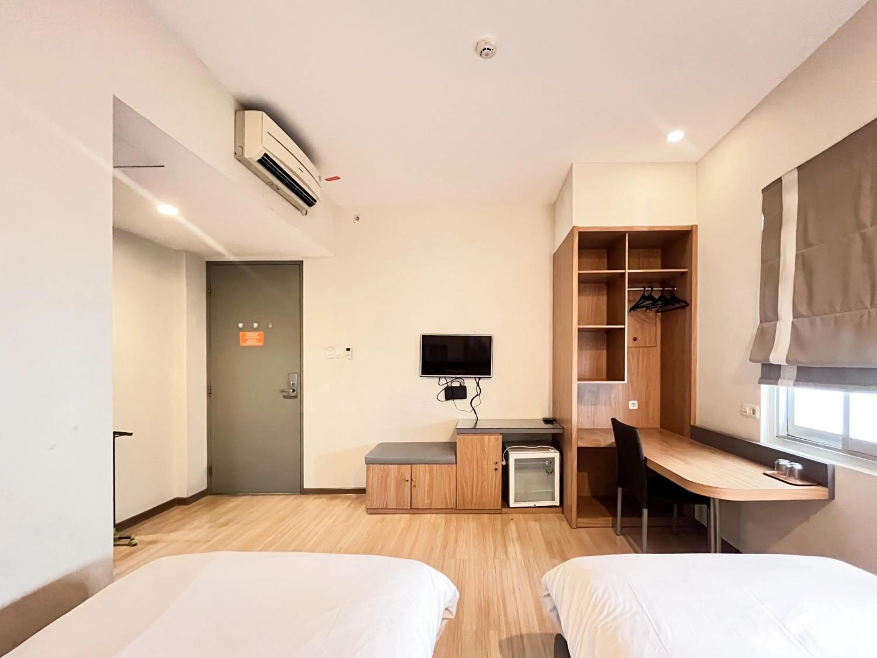 Bedroom, Bed in Sans Hotel Syariah Graha 100 Gubeng Surabaya