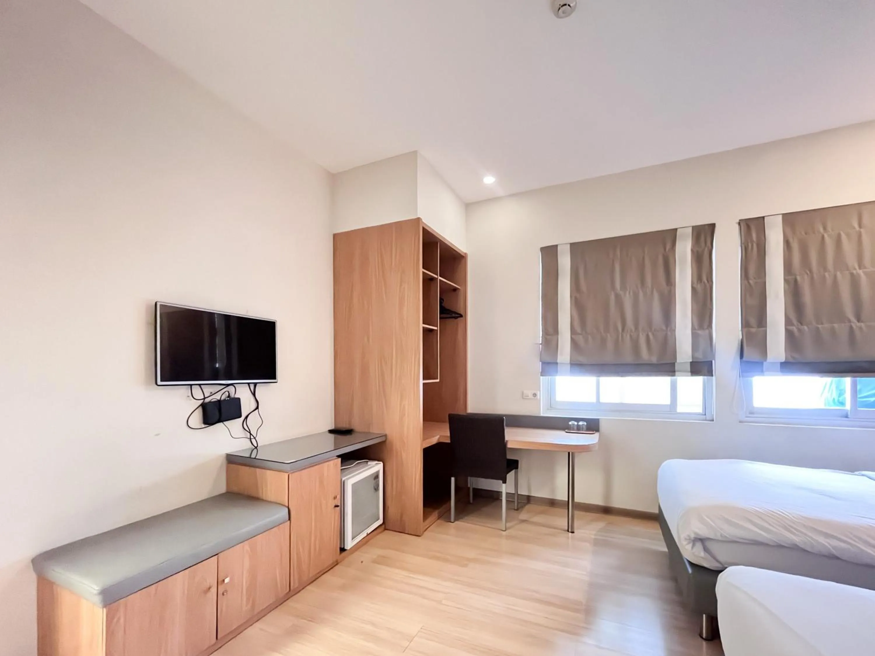 Bedroom, Bed in Sans Hotel Syariah Graha 100 Gubeng Surabaya