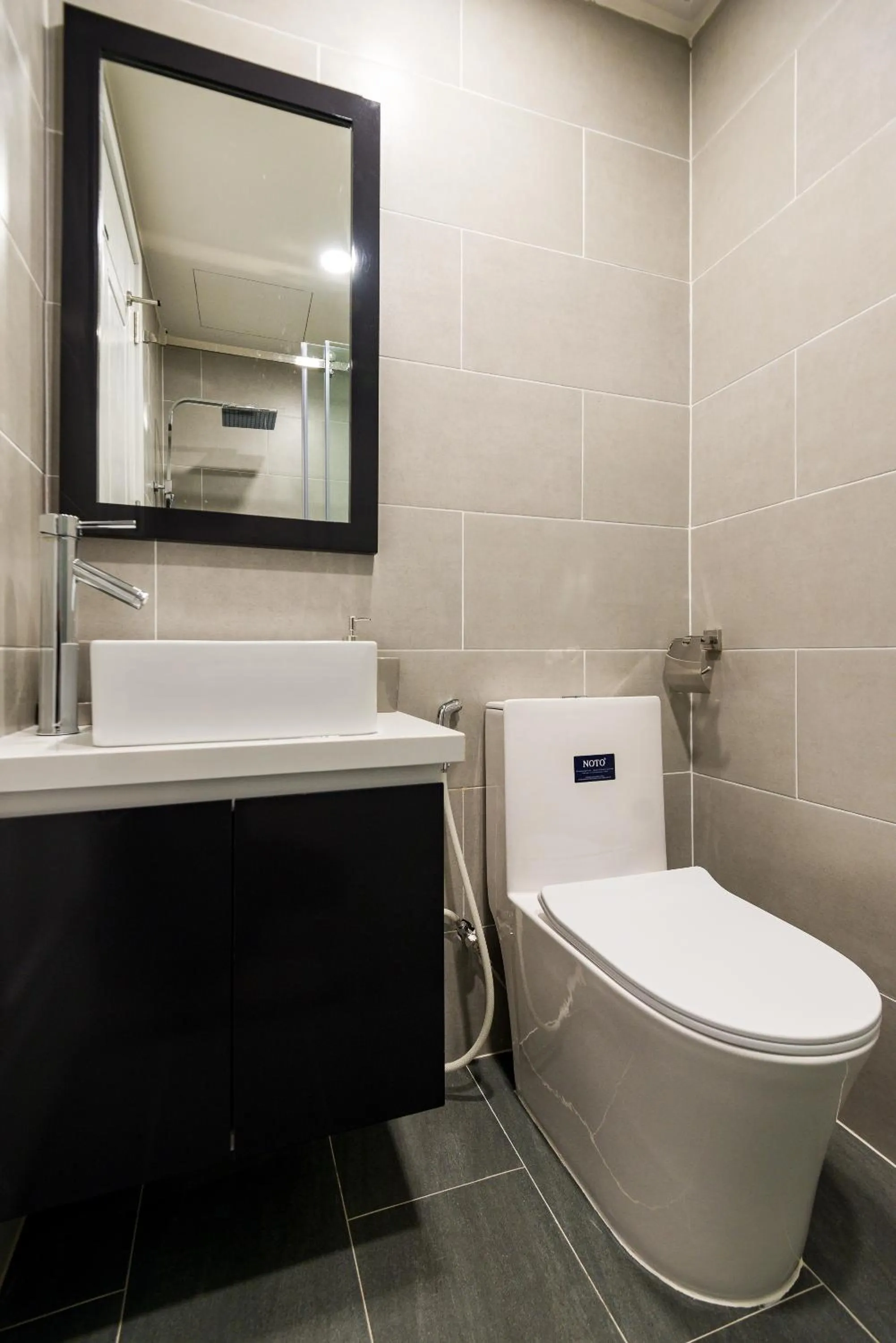 Bathroom in Cozrum Homes The Gallery Residence
