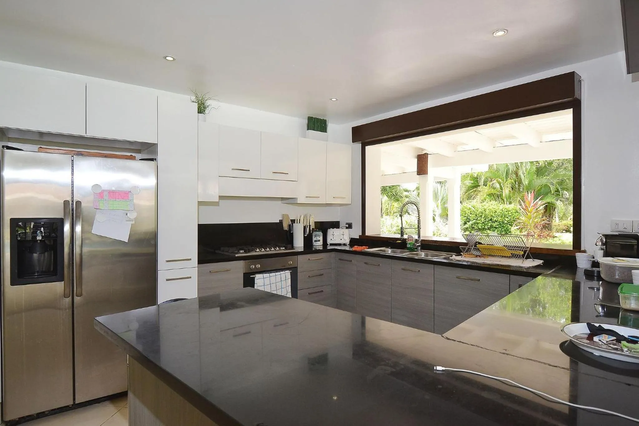 microwave in Las Terrenas Front Beach And Garden Villa with private staff