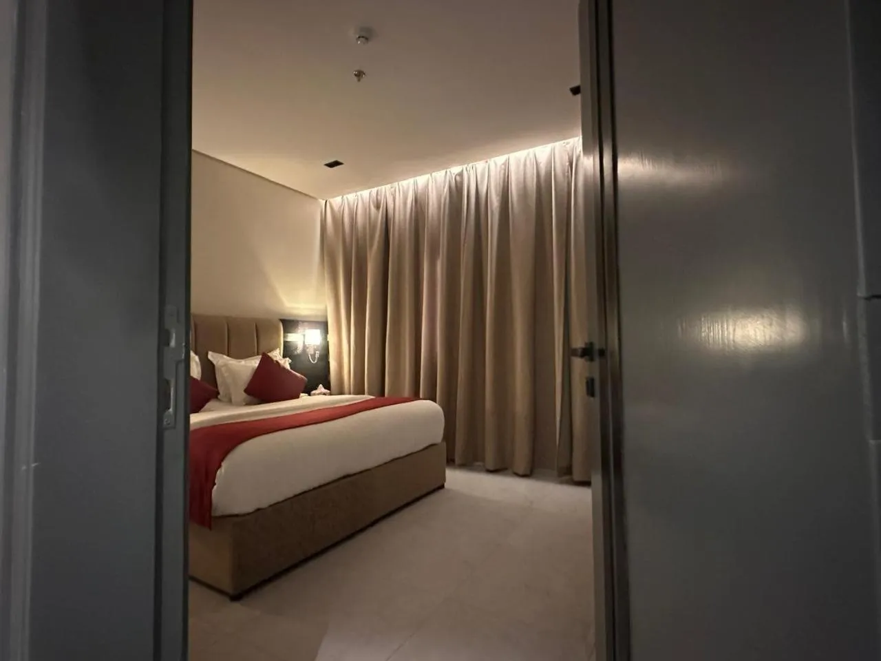 Photo of the whole room, Bed in Golden Galaxies Furnished Units