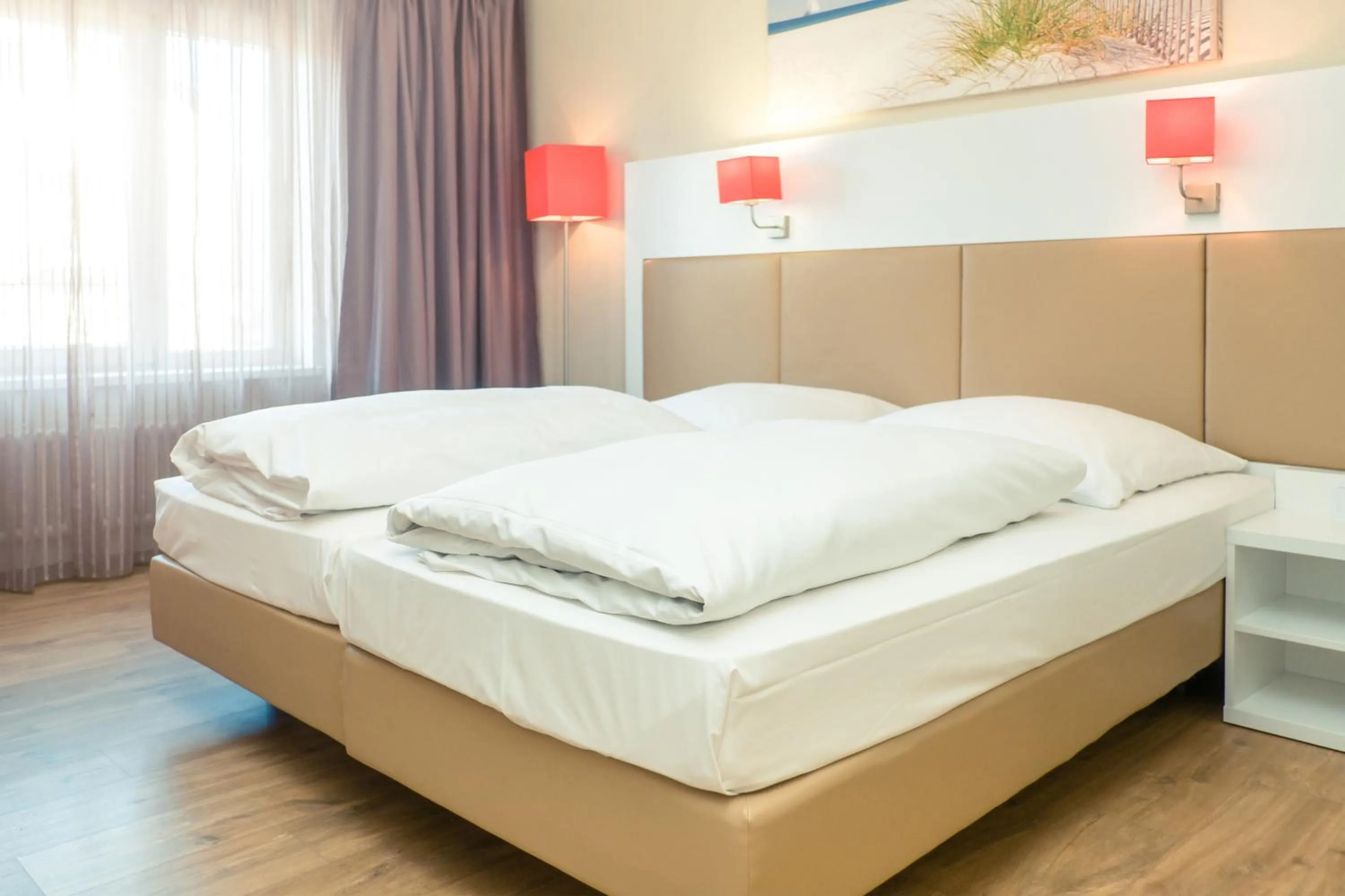 Photo of the whole room, Bed in Hotel Stuttgart Sindelfingen City by Tulip Inn