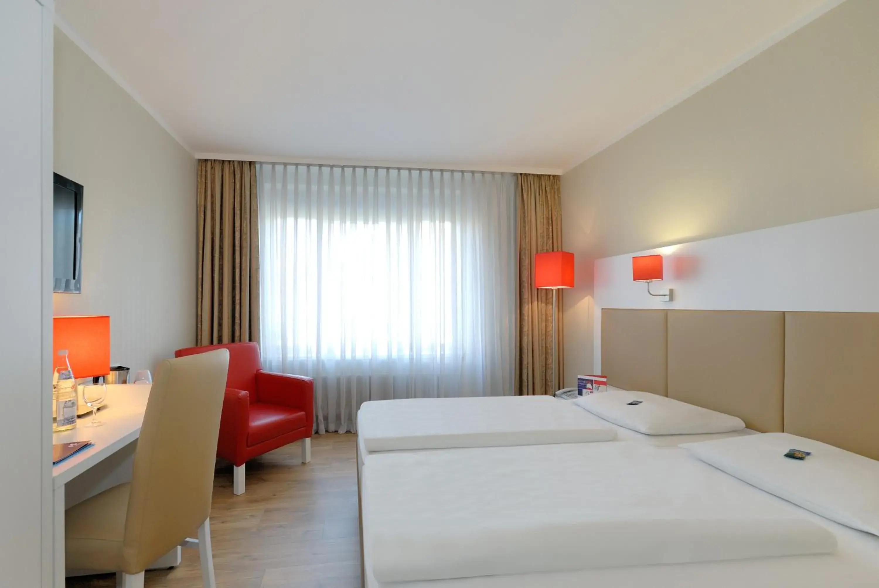 Photo of the whole room, Bed in Hotel Stuttgart Sindelfingen City by Tulip Inn Photo of the whole room, Bed in Hotel Stuttgart Sindelfingen City by Tulip Inn