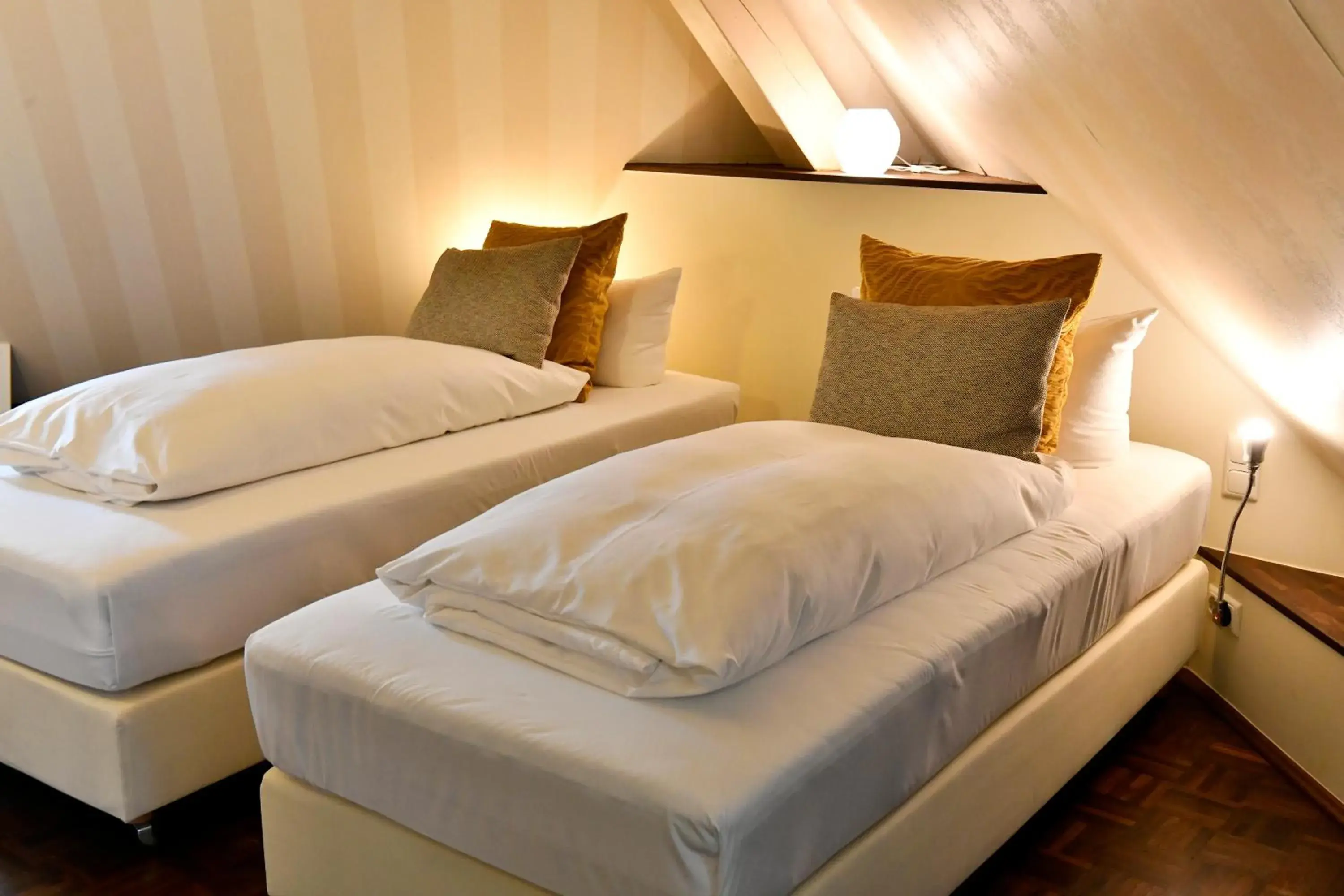 Bedroom, Bed in Villa Mittermeier, Hotellerie & Restaurant Bedroom, Bed in Villa Mittermeier, Hotellerie & Restaurant