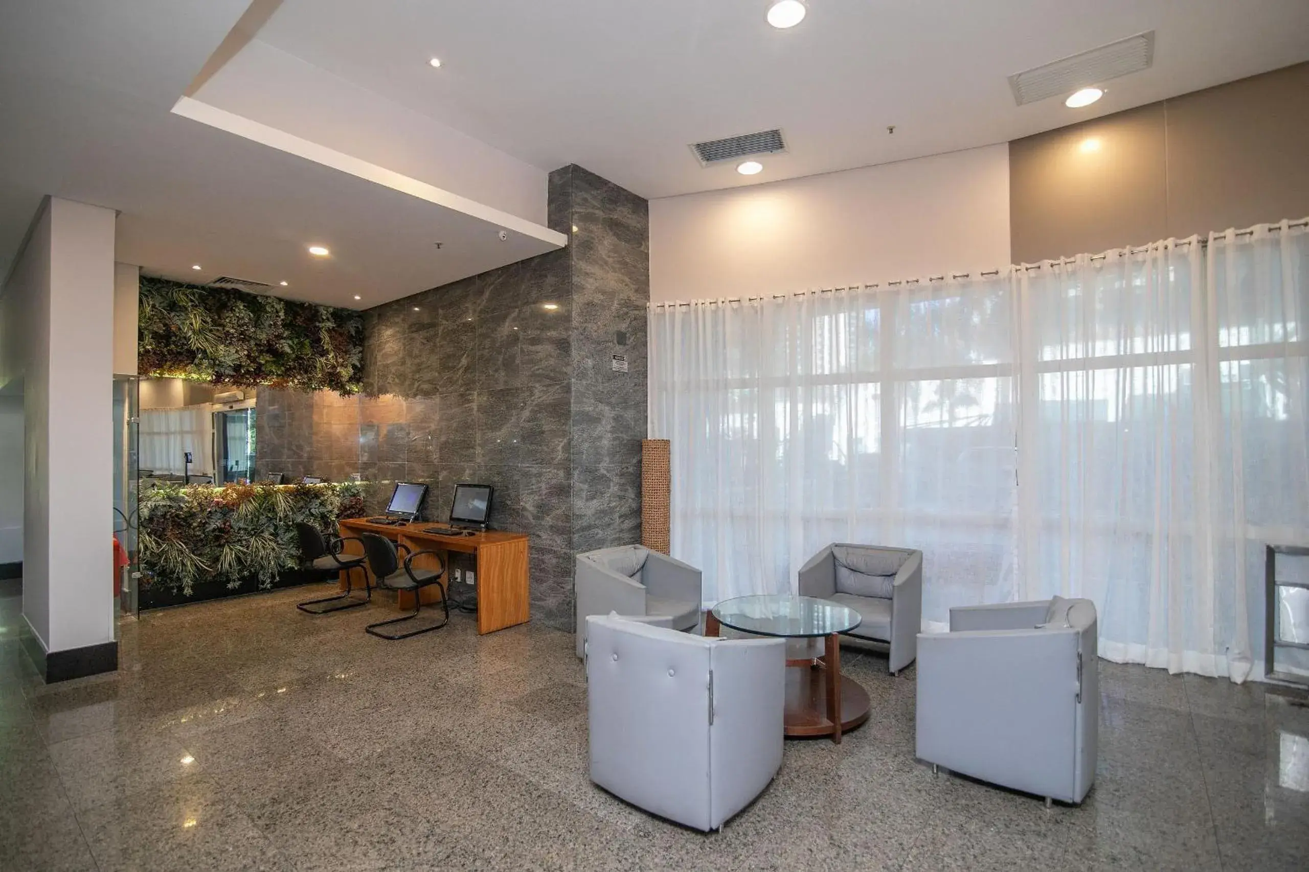 Lobby or reception in Flat Barra First - Morada Stay Lobby or reception in Flat Barra First - Morada Stay