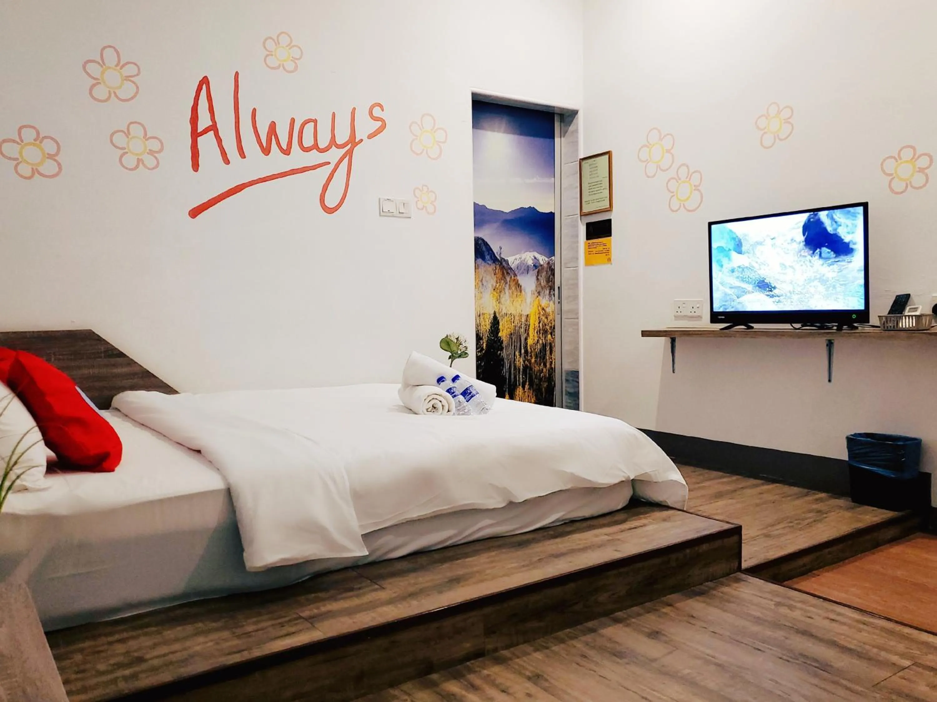 Bed in Winggarden Murals House by JE Boutique Guesthouse