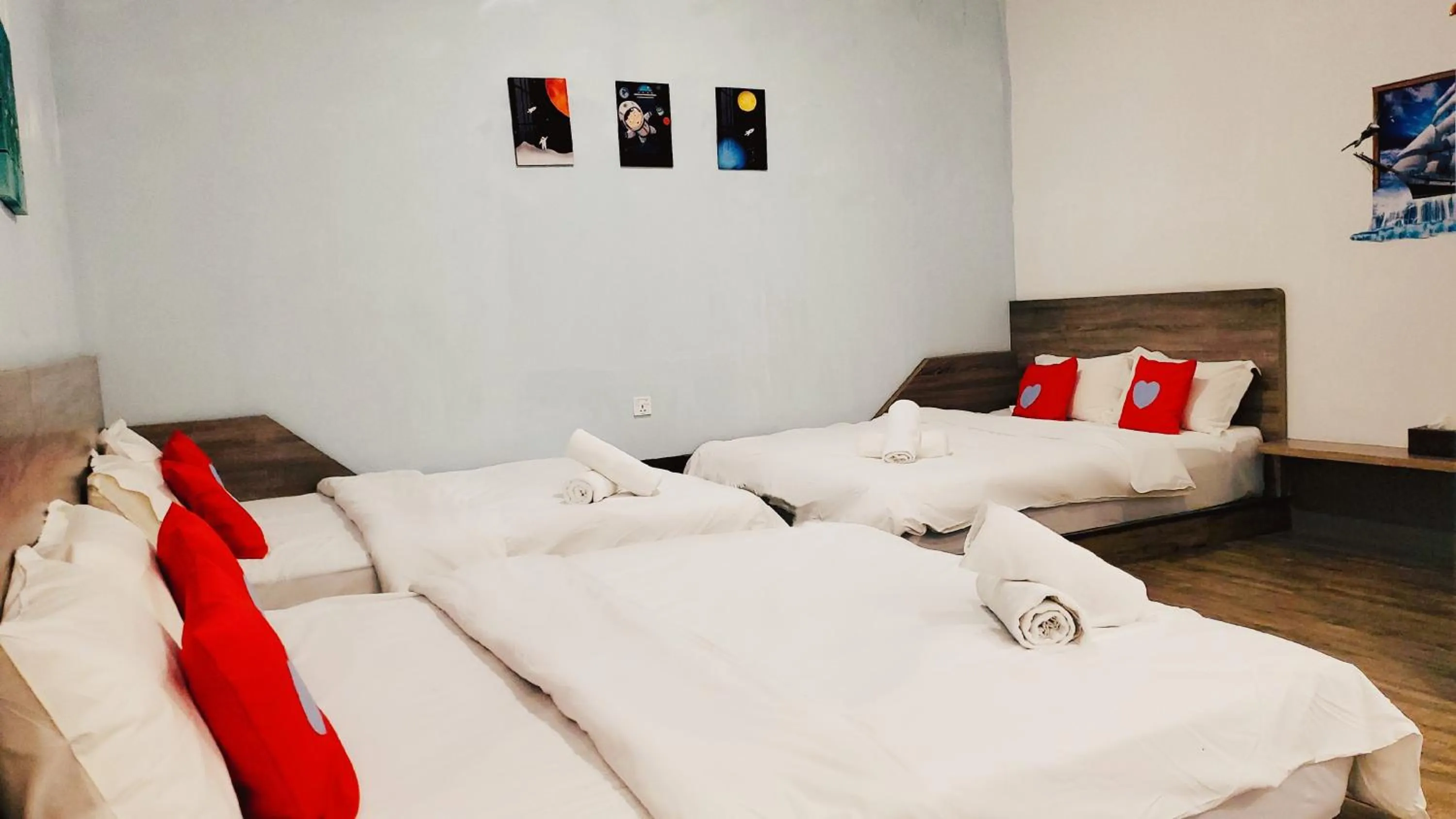 Bed in Winggarden Murals House by JE Boutique Guesthouse