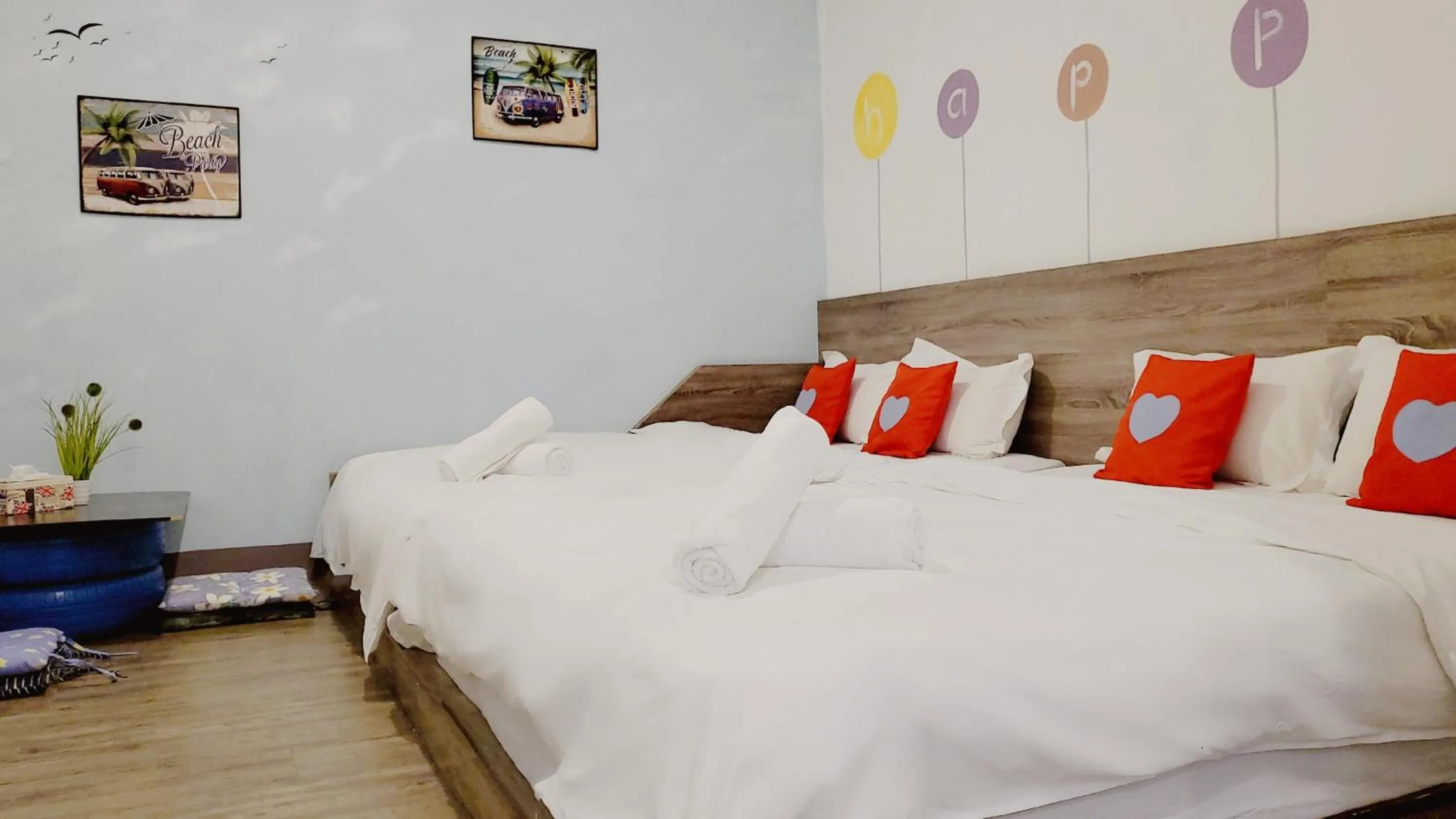 Bed in Winggarden Murals House by JE Boutique Guesthouse