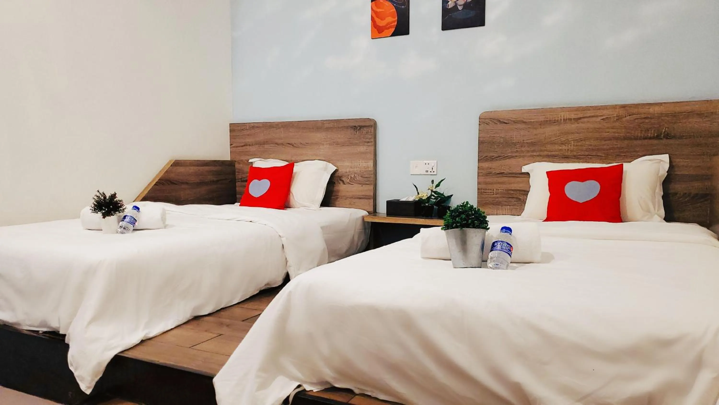 Bed in Winggarden Murals House by JE Boutique Guesthouse