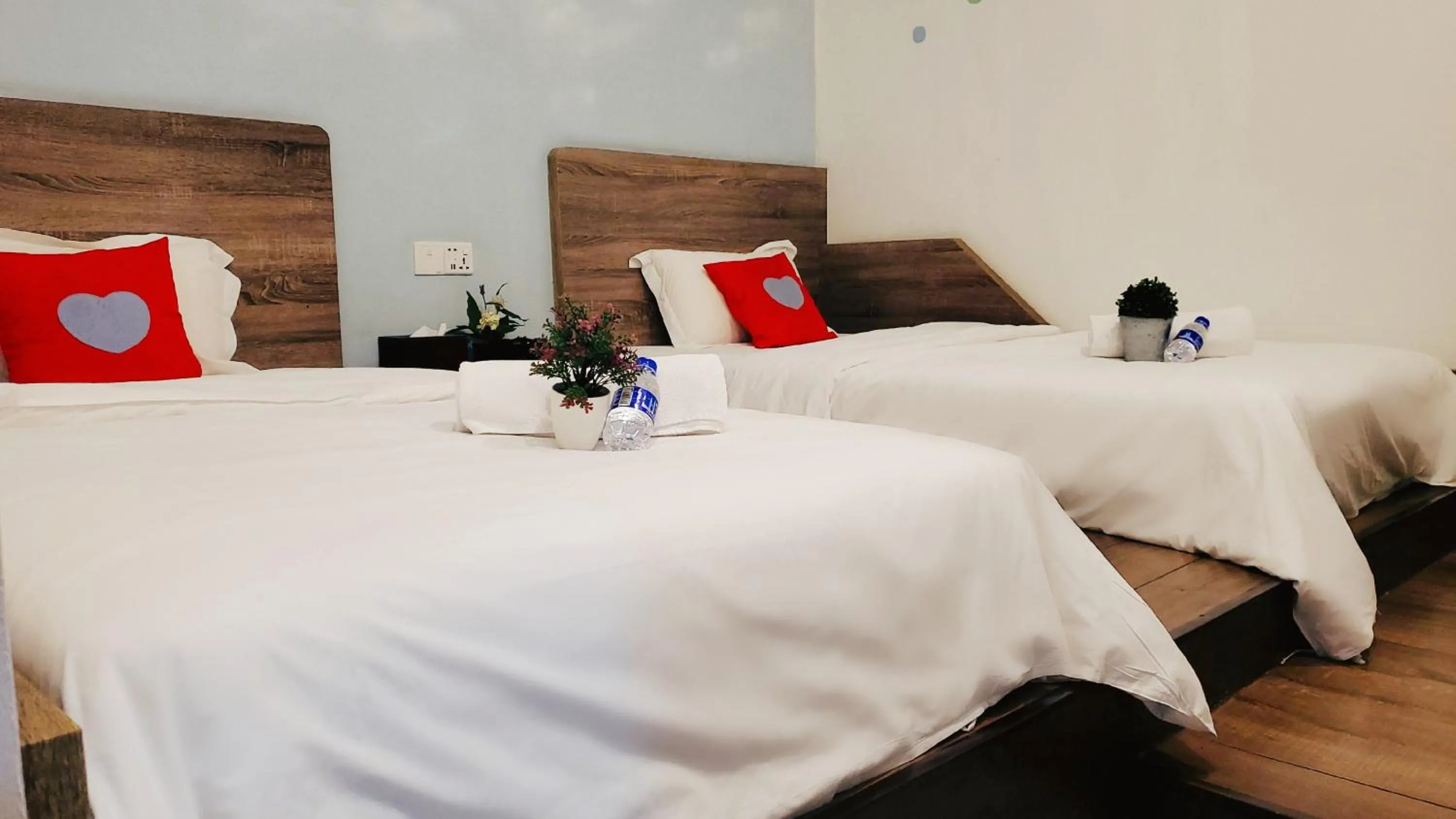 Bed in Winggarden Murals House by JE Boutique Guesthouse