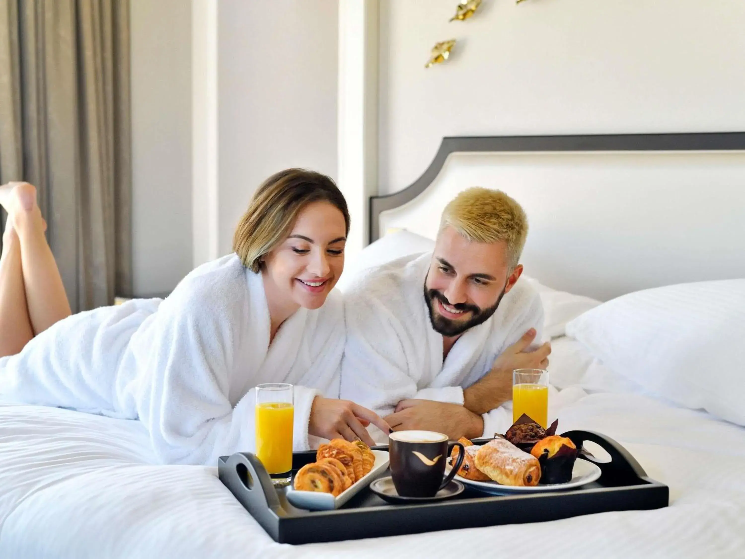 Bedroom, Bed in Mövenpick Hotel Bahrain Bedroom, Bed in Mövenpick Hotel Bahrain
