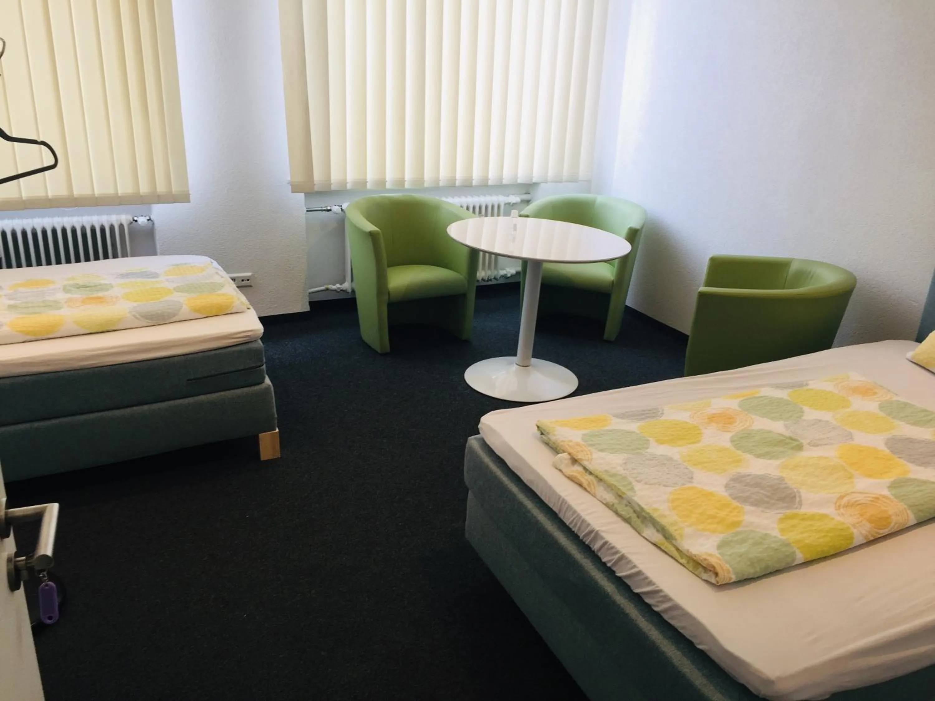 Seating area, Bed in Central Apartments Aalen