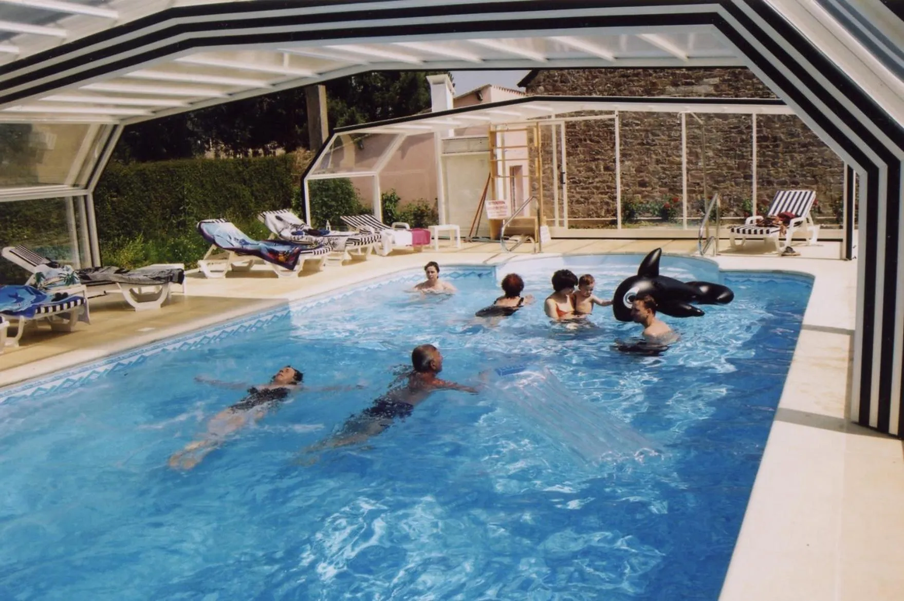 Swimming pool in Hôtel Le Trécelin