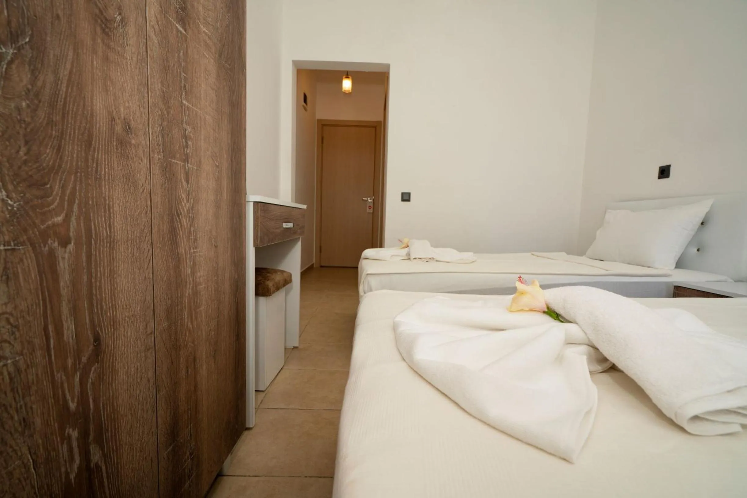 Bed in ESQUIRE HOTELS and LOUNGES