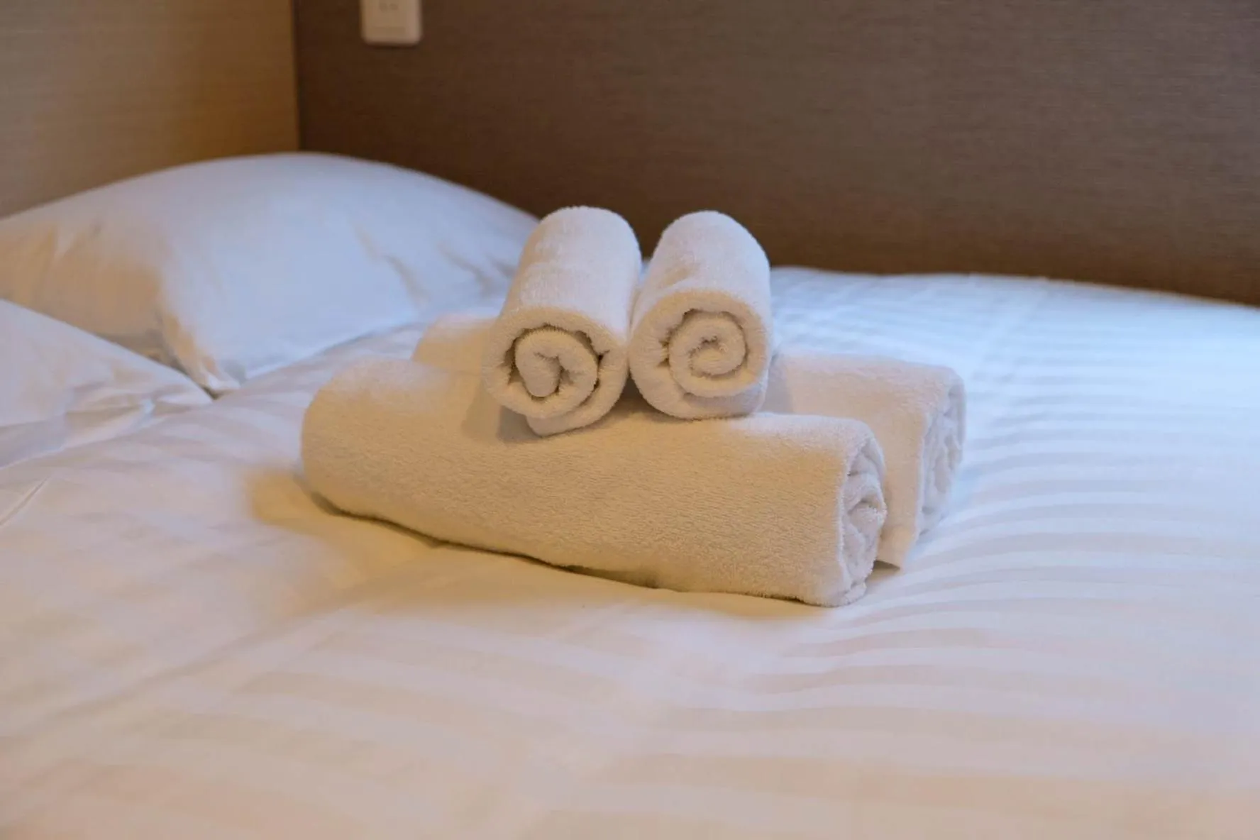 Bed in The Light Inn Tokyo