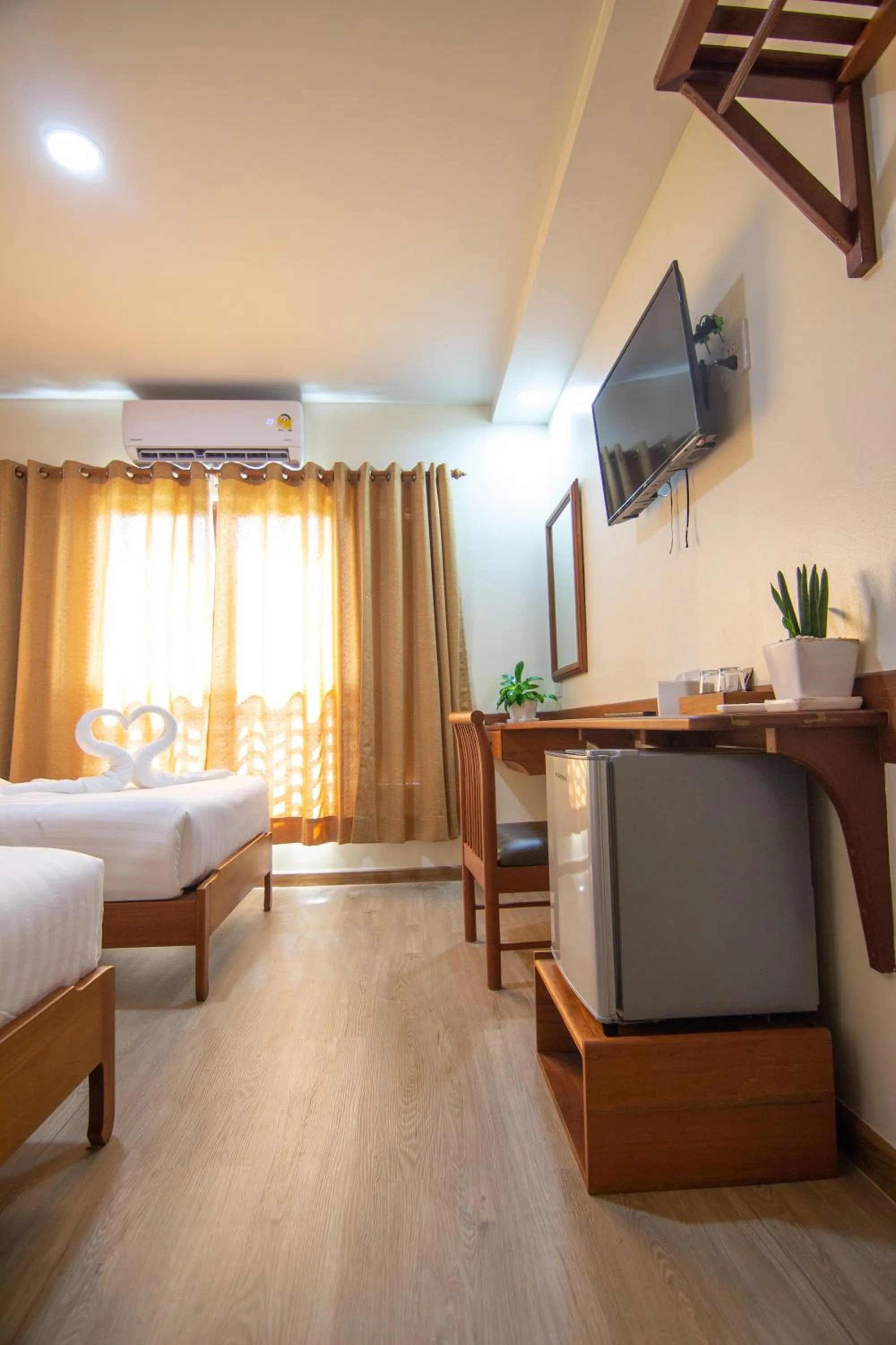 Photo of the whole room, Bed in Nonnee Lampang Hotel