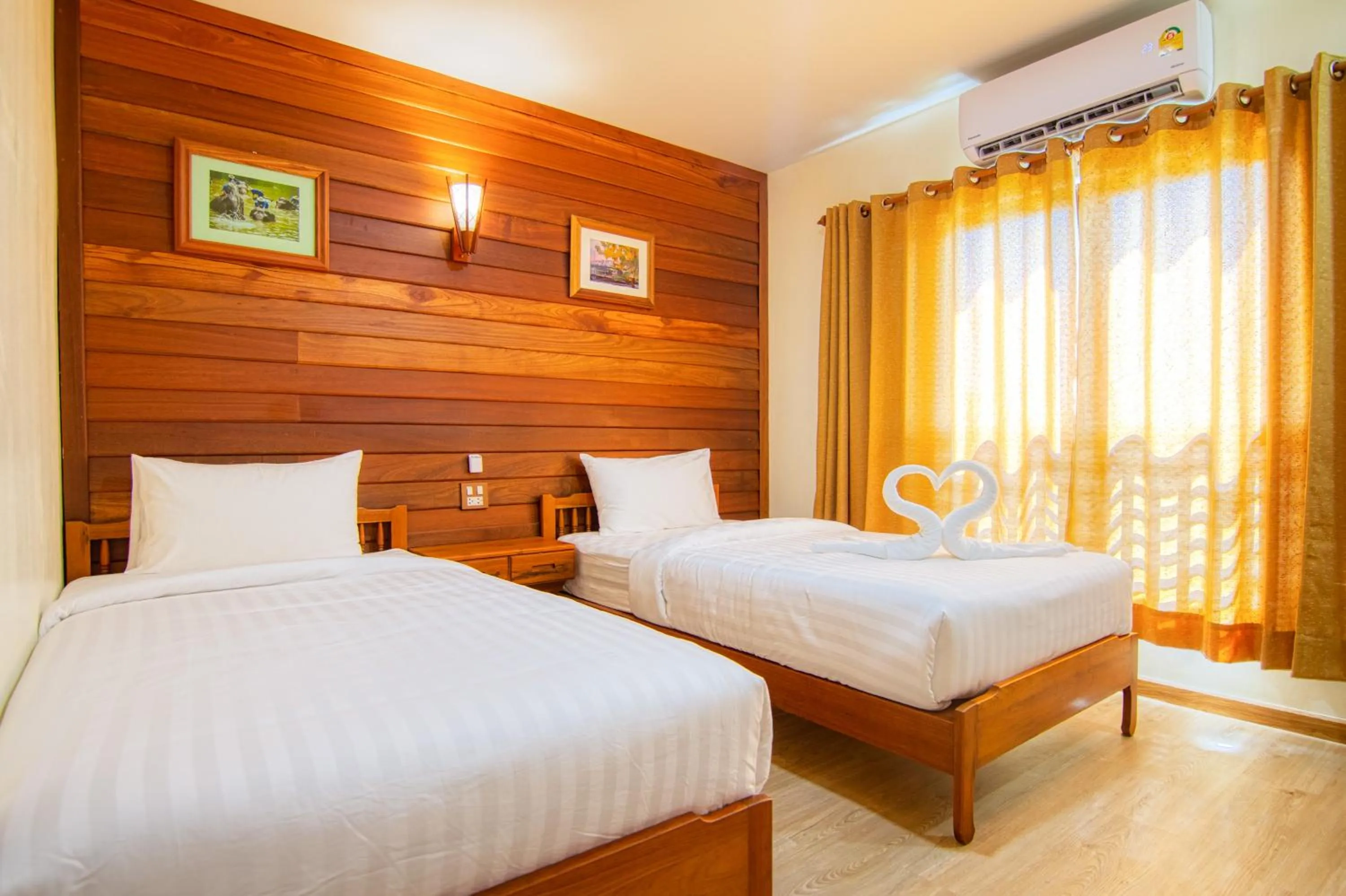 Photo of the whole room, Bed in Nonnee Lampang Hotel