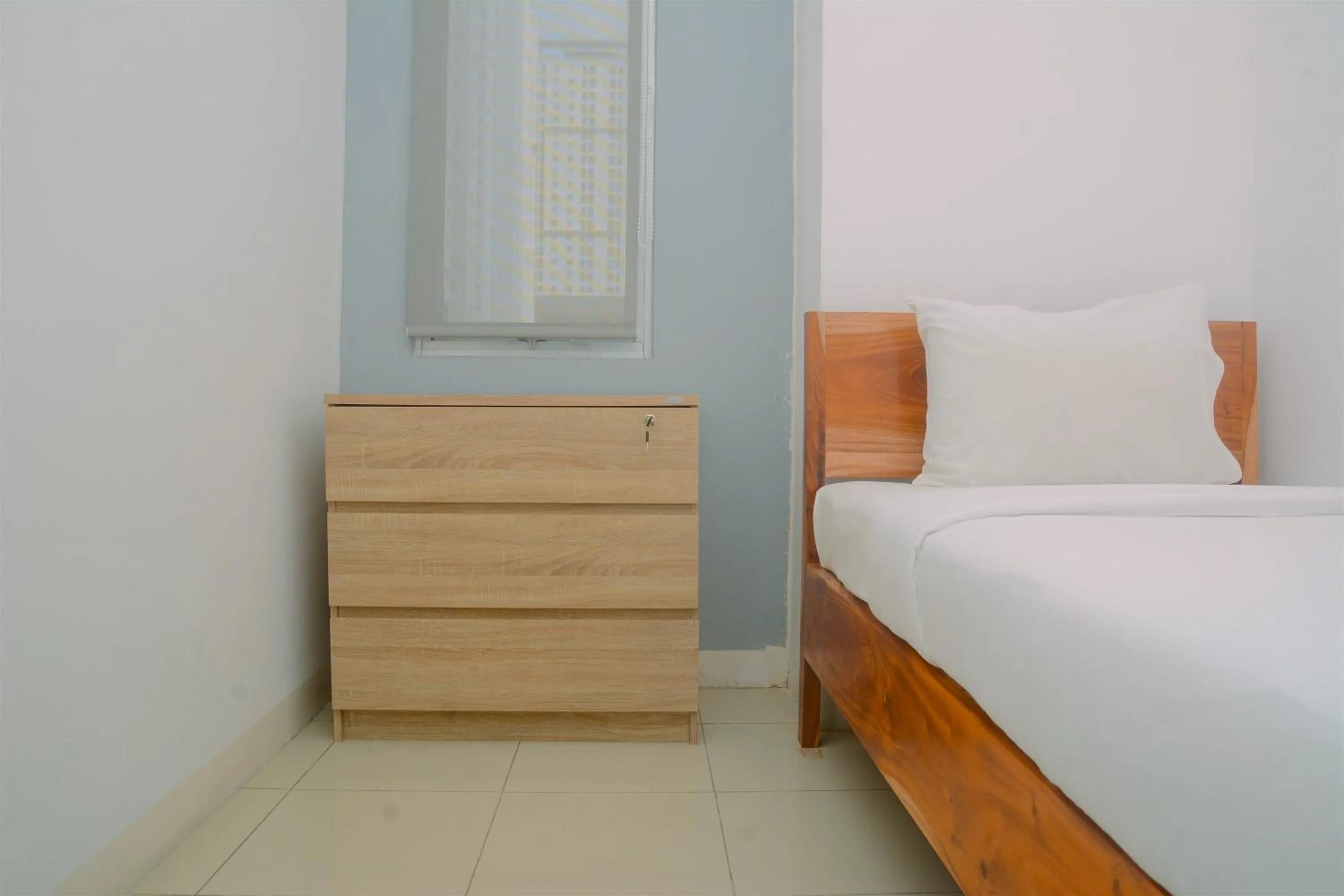 Bed in Best Deal 3BR Apartment Bassura City near Shopping Center By Travelio