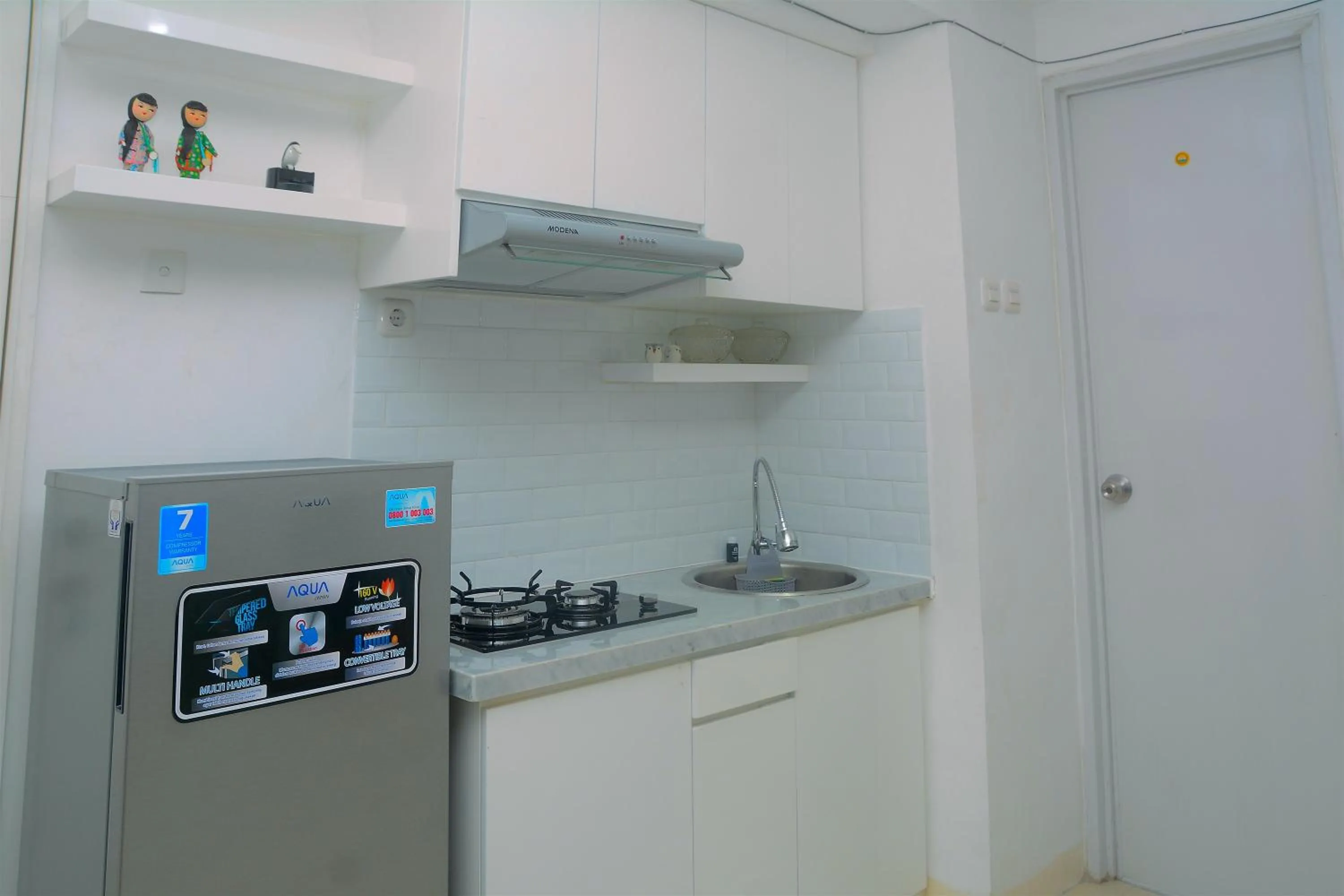 Kitchen or kitchenette in Best Deal 3BR Apartment Bassura City near Shopping Center By Travelio