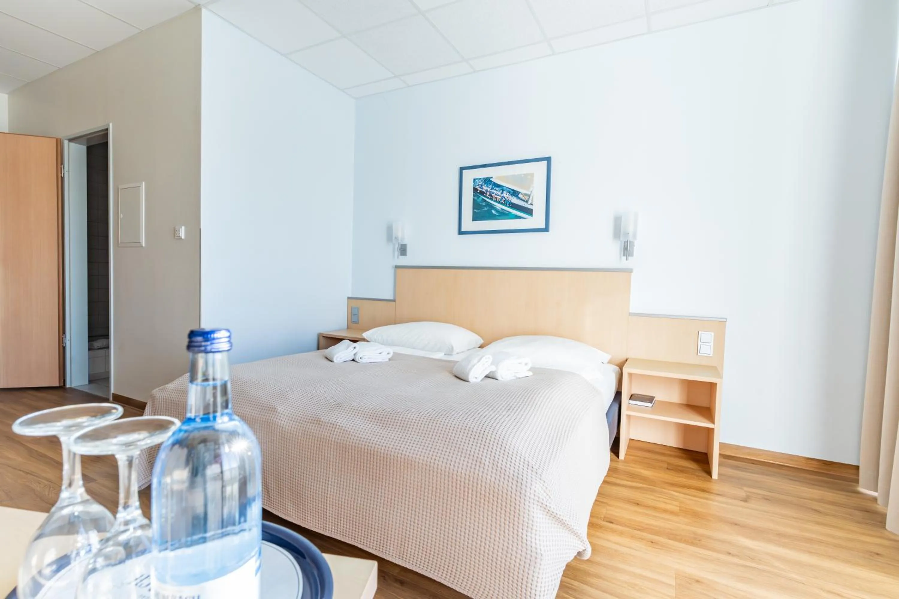 Photo of the whole room, Bed in Bodensee Yachthotel Schattmaier