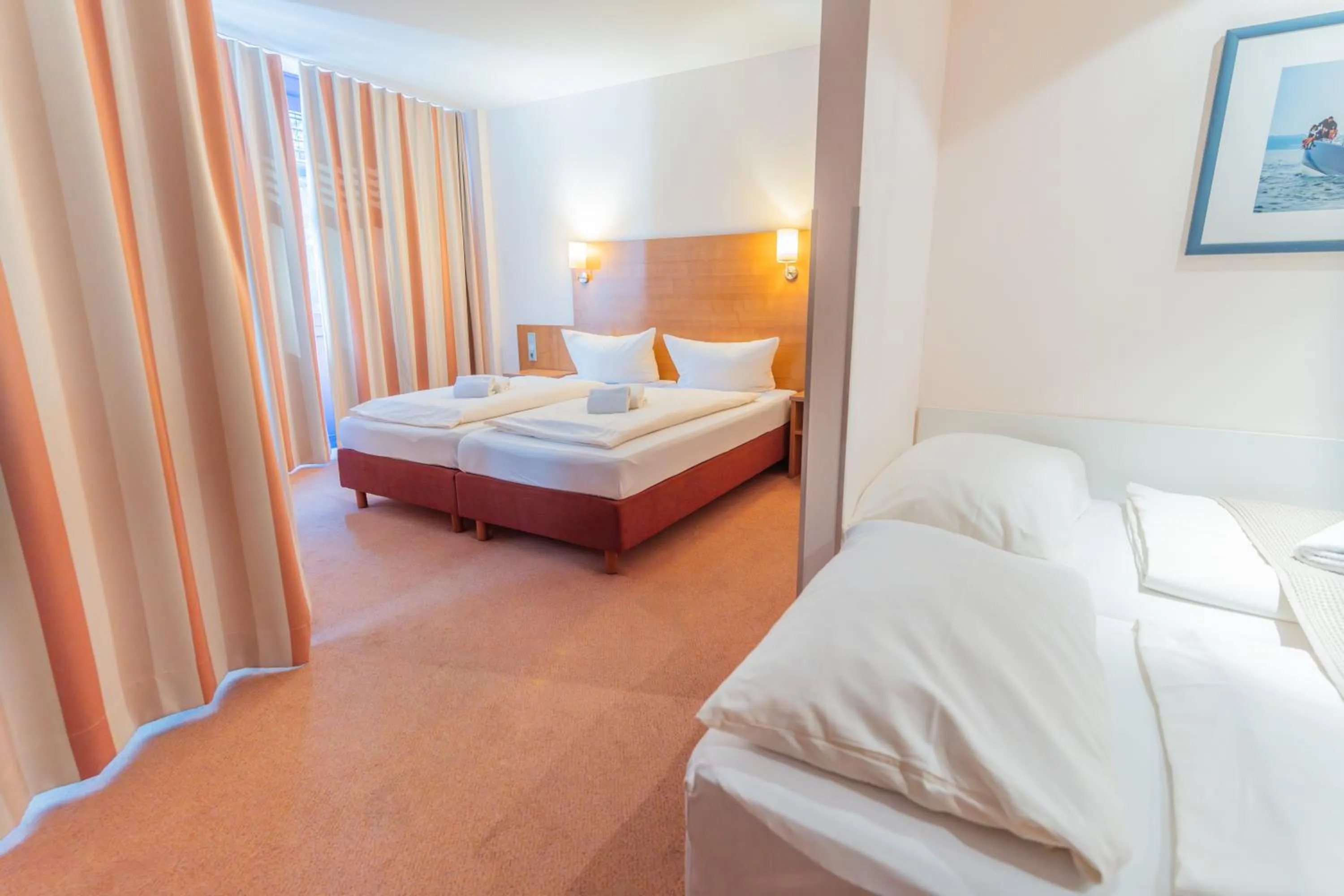 Bed in Bodensee Yachthotel Schattmaier