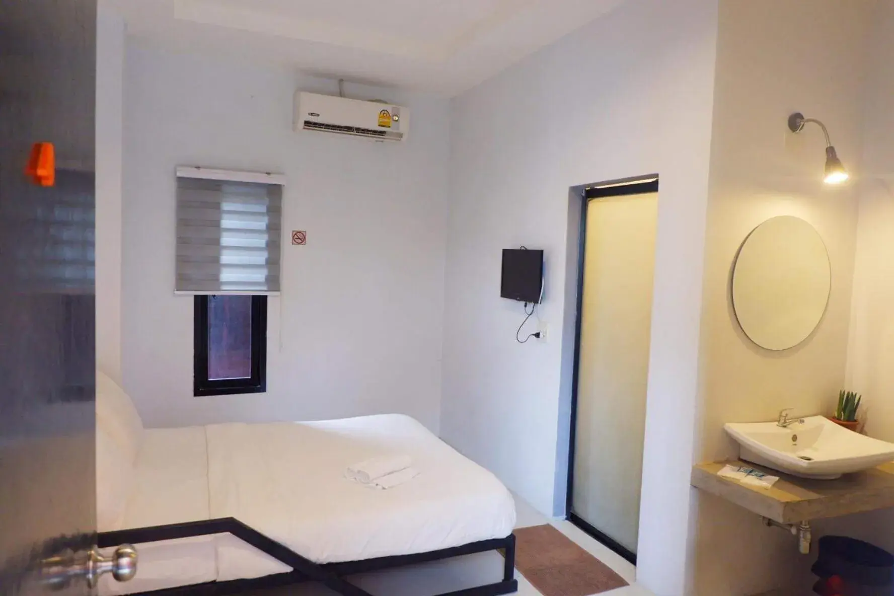 Bed in Rin GuestHouse Pracharak RD Bed in Rin GuestHouse Pracharak RD