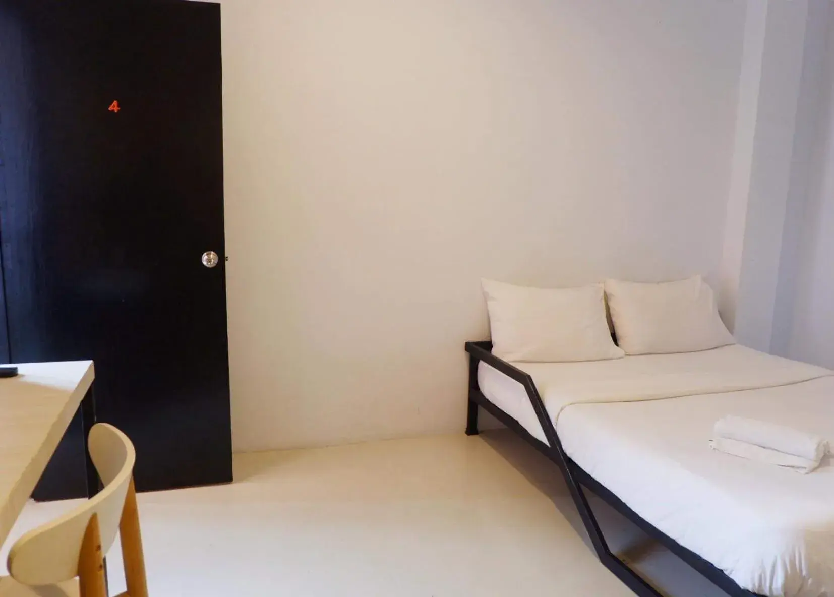 Bed in Rin GuestHouse Pracharak RD Bed in Rin GuestHouse Pracharak RD