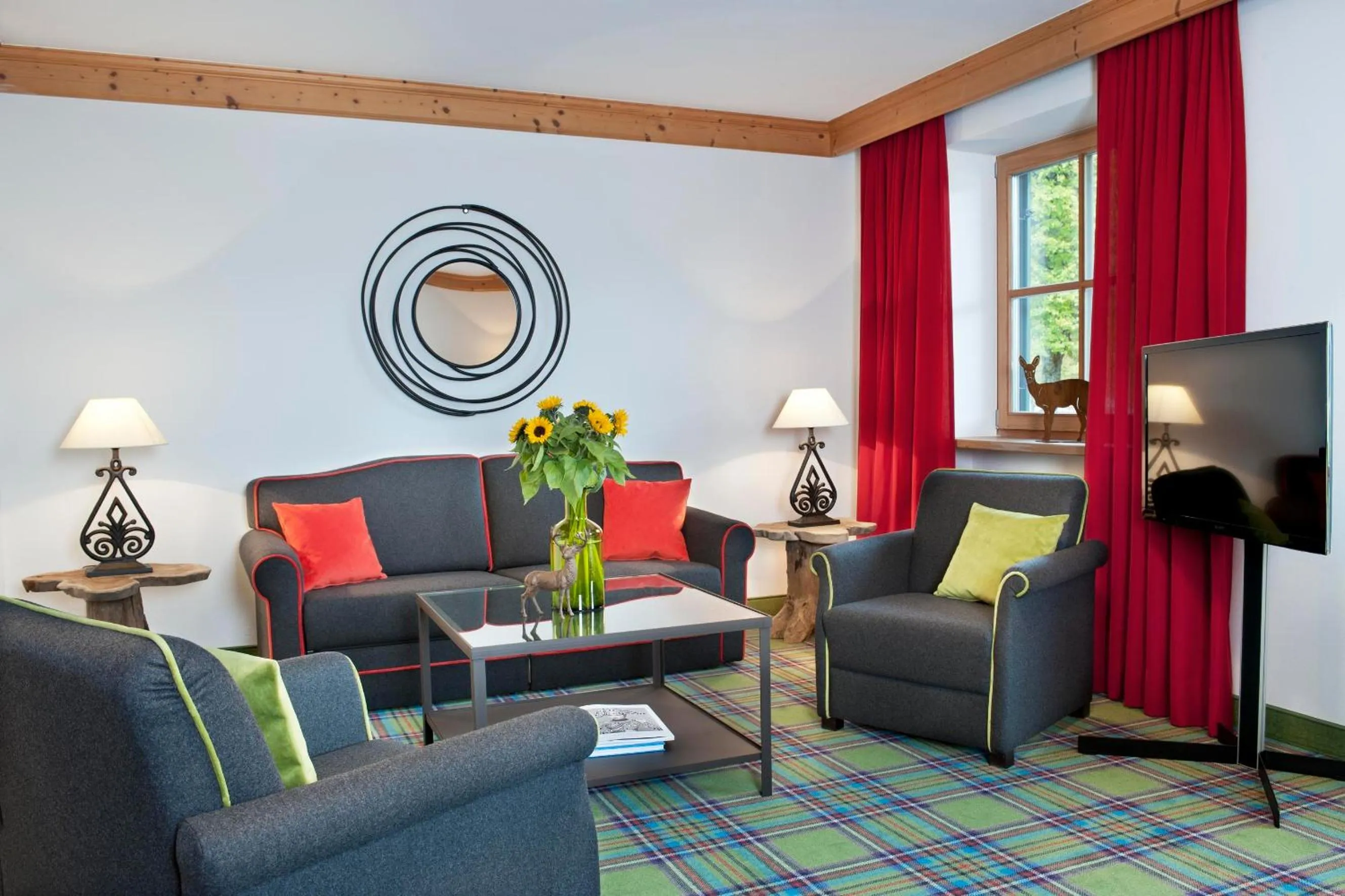 Communal lounge/ TV room in Relais & Châteaux Gut Steinbach Hotel Chalets SPA