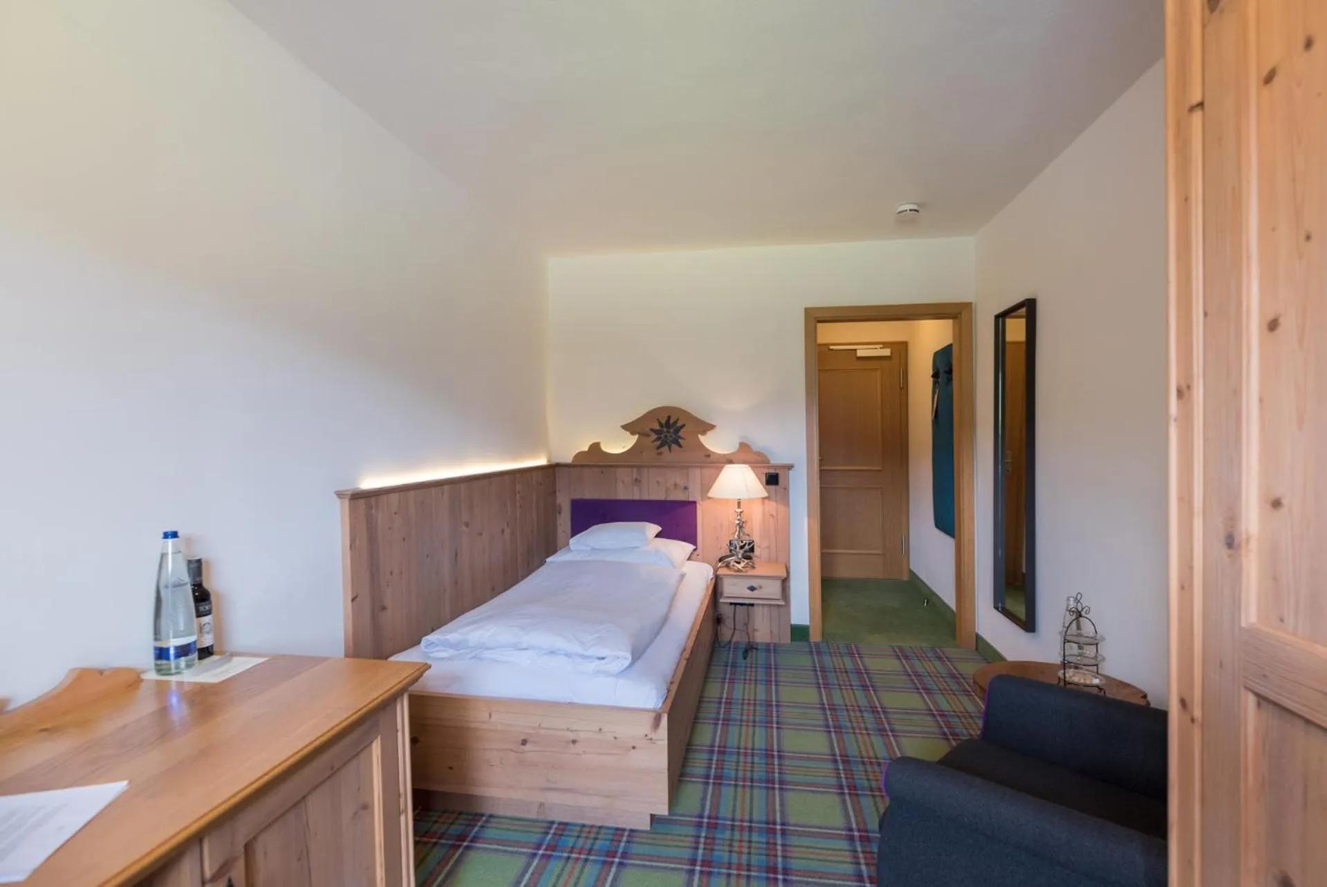 Bed in Relais & Châteaux Gut Steinbach Hotel Chalets SPA