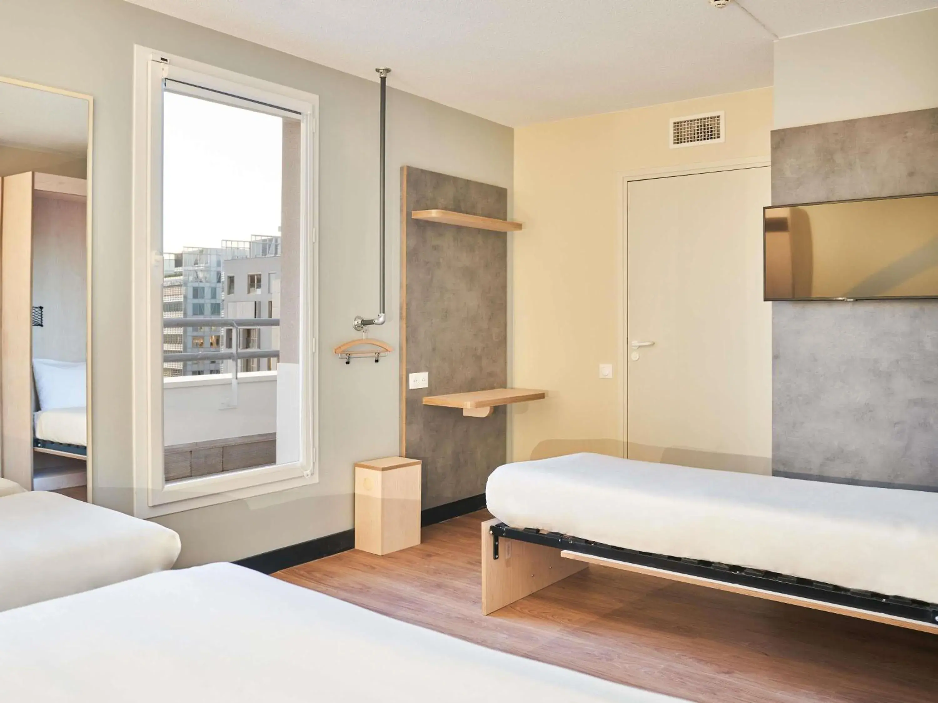 Bedroom, Bed in ibis budget Issy Les Moulineaux Paris Ouest Bedroom, Bed in ibis budget Issy Les Moulineaux Paris Ouest