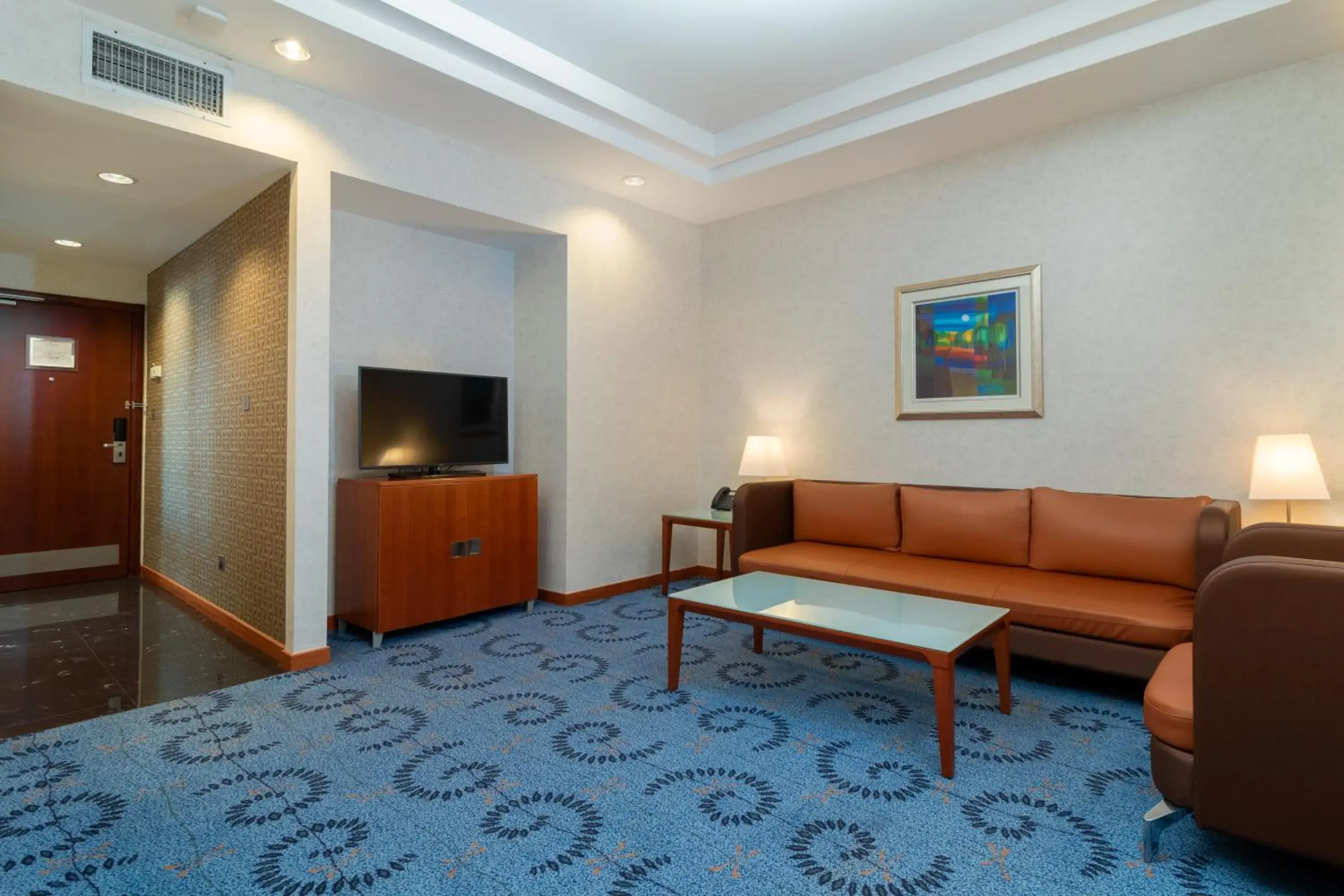 Living room in Holiday Inn - Suites Kuwait Salmiya by IHG Living room in Holiday Inn - Suites Kuwait Salmiya by IHG